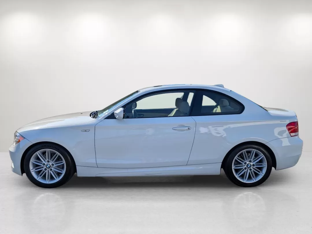 2013 BMW 1 Series 128i (WBAUP7C5XDV) with an Other engine, located at 1430 Gateway Drive, Opelika, AL, 36801, (334) 239-0944, 32.637871, -85.409790 - 2013 BMW 1 Series 128i - Photo#7