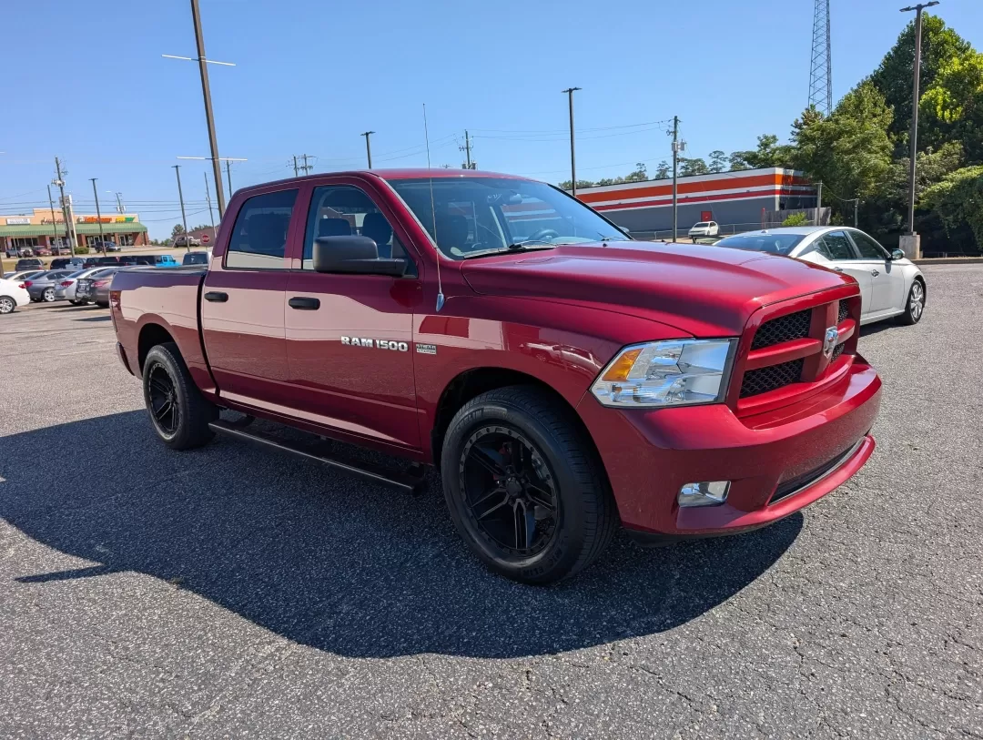 2012 /Dark Slate/Medium Graystone Ram 1500 Express (1C6RD6KT9CS) with an Other engine, located at 3959 U.S. 80 W, Phenix City, AL, 36870, (334) 297-4885, 32.469296, -85.135185 - **Drive Your Adventures with Confidence in this 2012 Ram 1500 Express Crew Cab!**<br /> <br /> Are you ready to elevate your weekend adventures or tackle your daily commute with style and power? At Gils Auto in Phenix City, AL, we have just the vehicle for you! This striking Deep Cherry Red Crystal - Photo#2