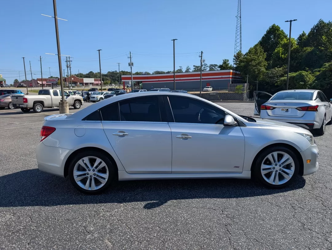 2015 /Jet Black Chevrolet Cruze LTZ (1G1PG5SB8F7) with an Other engine, located at 3959 U.S. 80 W, Phenix City, AL, 36870, (334) 297-4885, 32.469296, -85.135185 - **Discover Unmatched Style and Comfort with the 2015 Chevrolet Cruze LTZ at Gils Auto!**<br /> <br /> Are you in search of a reliable vehicle that fits seamlessly into your daily life? The 2015 Chevrolet Cruze LTZ is the perfect sedan for anyone seeking a stylish ride that excels in efficiency and c - Photo#3