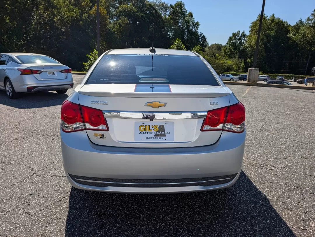 2015 /Jet Black Chevrolet Cruze LTZ (1G1PG5SB8F7) with an Other engine, located at 3959 U.S. 80 W, Phenix City, AL, 36870, (334) 297-4885, 32.469296, -85.135185 - **Discover Unmatched Style and Comfort with the 2015 Chevrolet Cruze LTZ at Gils Auto!**<br /> <br /> Are you in search of a reliable vehicle that fits seamlessly into your daily life? The 2015 Chevrolet Cruze LTZ is the perfect sedan for anyone seeking a stylish ride that excels in efficiency and c - Photo#5