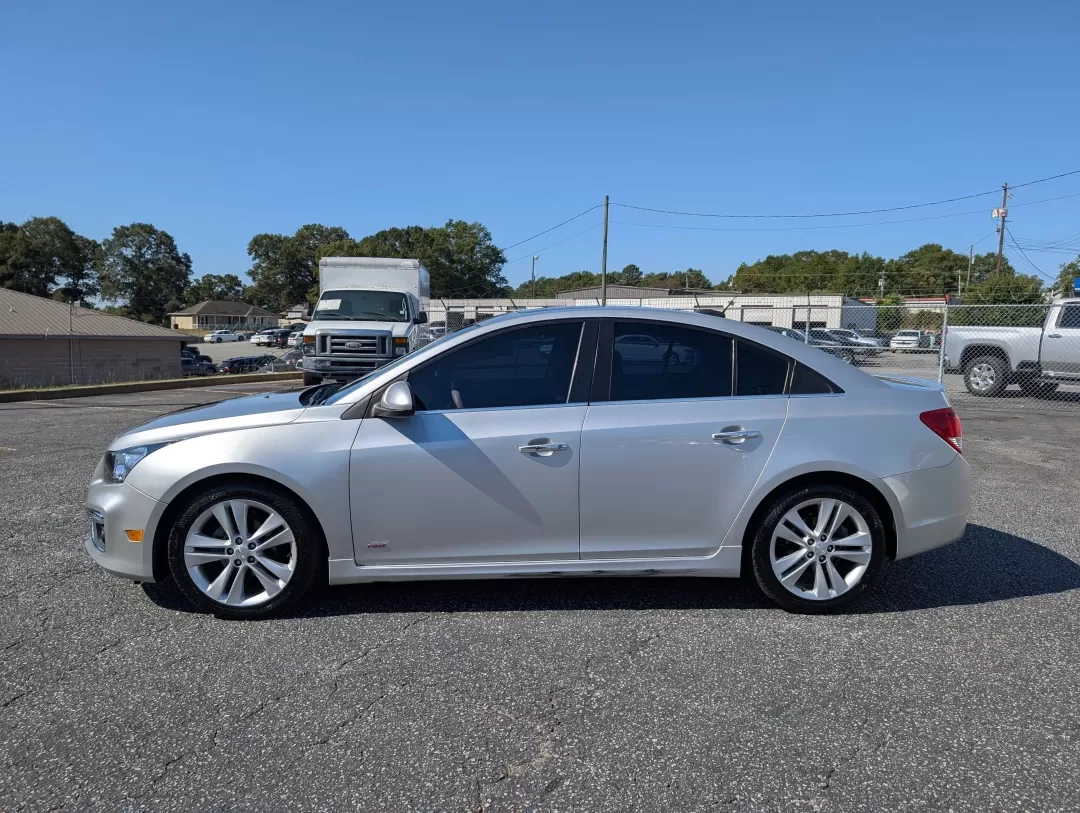 2015 /Jet Black Chevrolet Cruze LTZ (1G1PG5SB8F7) with an Other engine, located at 3959 U.S. 80 W, Phenix City, AL, 36870, (334) 297-4885, 32.469296, -85.135185 - **Discover Unmatched Style and Comfort with the 2015 Chevrolet Cruze LTZ at Gils Auto!**<br /> <br /> Are you in search of a reliable vehicle that fits seamlessly into your daily life? The 2015 Chevrolet Cruze LTZ is the perfect sedan for anyone seeking a stylish ride that excels in efficiency and c - Photo#7