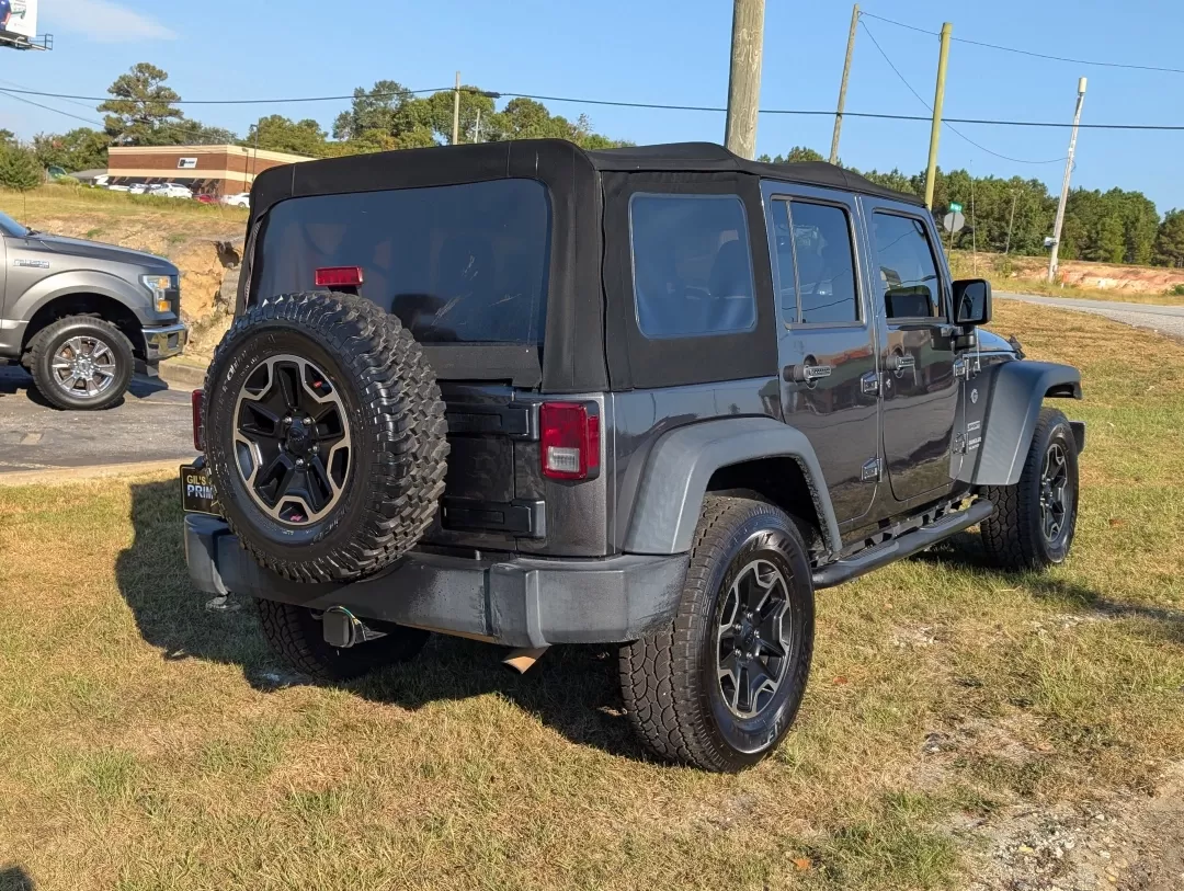 2017 /Black Jeep Wrangler Sport (1C4BJWDG5HL) with an Other engine, located at 3959 U.S. 80 W, Phenix City, AL, 36870, (334) 297-4885, 32.469296, -85.135185 - **Adventure Awaits: 2017 Jeep Wrangler Sport in Phenix City, AL**<br /> <br /> Are you ready to take on the open road and explore the great outdoors? The 2017 Jeep Wrangler Sport is not just a vehicle; it's a lifestyle. Built for adventure, this rugged SUV is perfect for weekend escapades, off-road - Photo#5