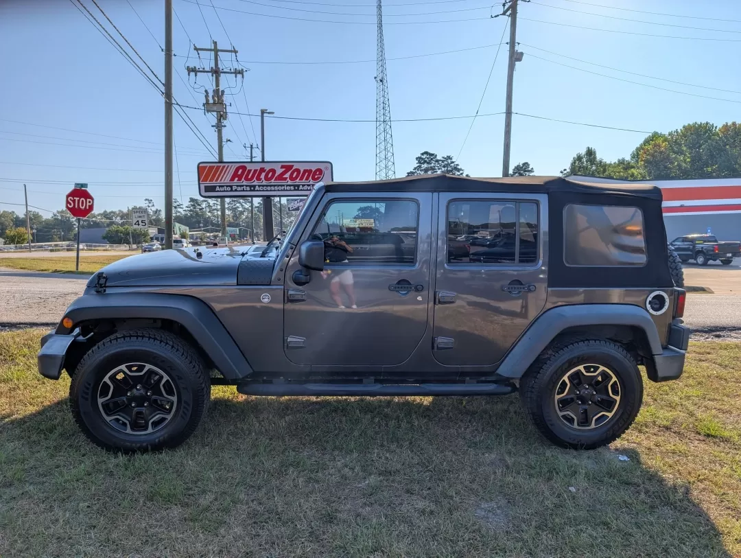 2017 /Black Jeep Wrangler Sport (1C4BJWDG5HL) with an Other engine, located at 3959 U.S. 80 W, Phenix City, AL, 36870, (334) 297-4885, 32.469296, -85.135185 - **Adventure Awaits: 2017 Jeep Wrangler Sport in Phenix City, AL**<br /> <br /> Are you ready to take on the open road and explore the great outdoors? The 2017 Jeep Wrangler Sport is not just a vehicle; it's a lifestyle. Built for adventure, this rugged SUV is perfect for weekend escapades, off-road - Photo#8