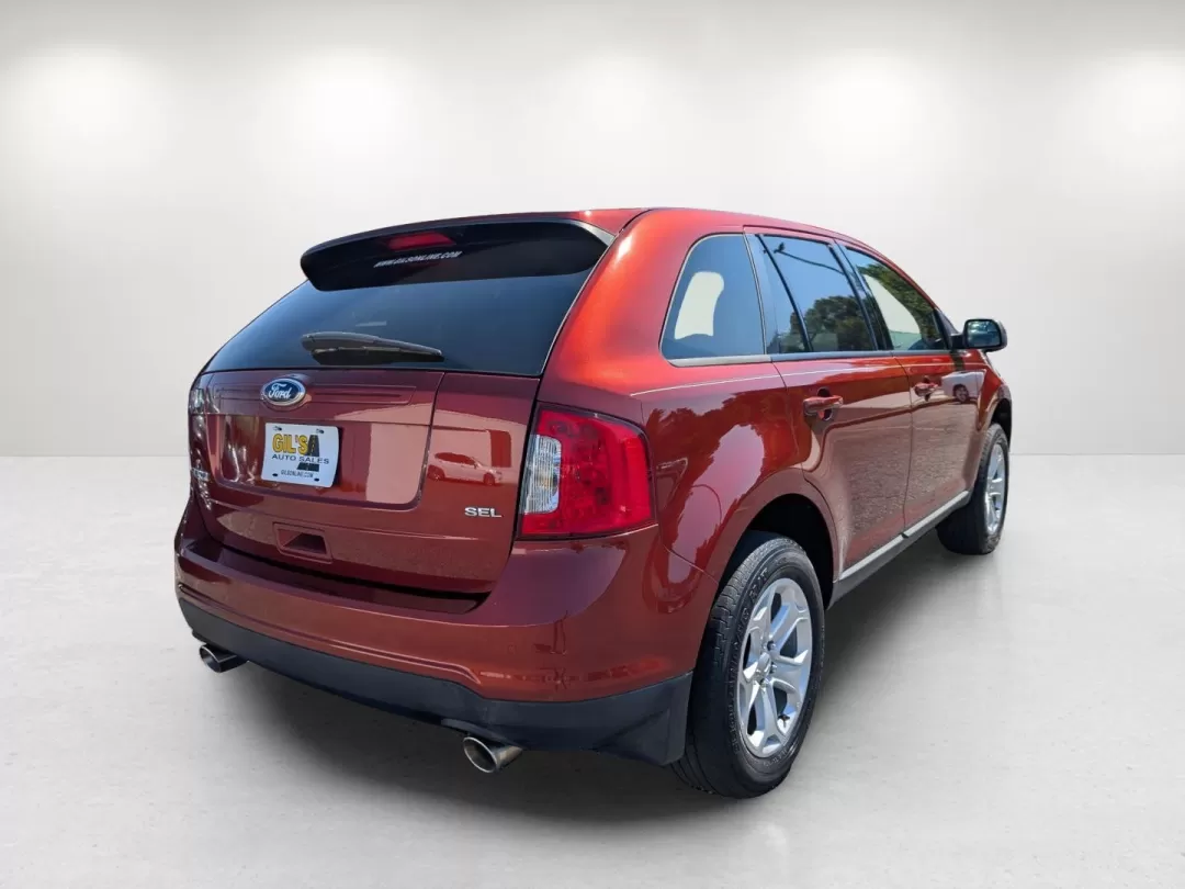 2014 Ford Edge SEL (2FMDK3JC5EB) with an Other engine, located at 7000 Northlake Connector, Columbus, GA, 31904, (706) 987-8085, 32.524975, -84.978134 - Are you searching for the perfect SUV to elevate your everyday adventures? Look no further than this stunning 2014 Ford Edge SEL at Gils Auto in Phenix City, AL. Perfect for growing families or anyone looking for a reliable vehicle for their daily commute, this versatile SUV offers a blend of comfor - Photo#4