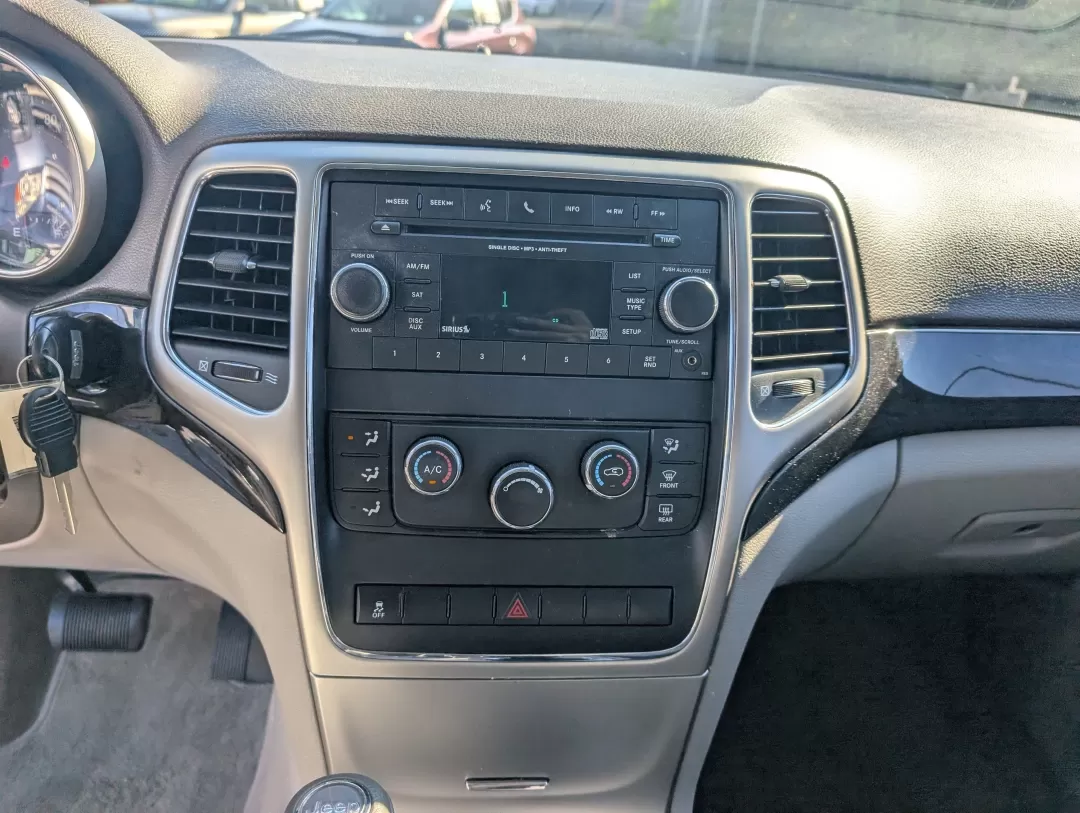 2012 /Dark Graystone/Medium Graystone Jeep Grand Cherokee Laredo (1C4RJFAG5CC) with an Other engine, located at 7000 Northlake Connector, Columbus, GA, 31904, (706) 987-8085, 32.524975, -84.978134 - 2012 Jeep Grand Cherokee Laredo - Photo#13