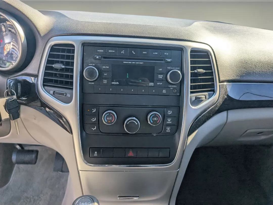2012 /Dark Graystone/Medium Graystone Jeep Grand Cherokee Laredo (1C4RJFAG5CC) with an Other engine, located at 7000 Northlake Connector, Columbus, GA, 31904, (706) 987-8085, 32.524975, -84.978134 - **Adventure Awaits with This 2012 Jeep Grand Cherokee Laredo at Gils Auto - Your Local Buy Here Pay Here Dealership!**<br /> <br /> Are you ready to embark on your next adventure? The 2012 Jeep Grand Cherokee Laredo is the perfect companion for those who crave exploration and comfort. Whether you're - Photo#14