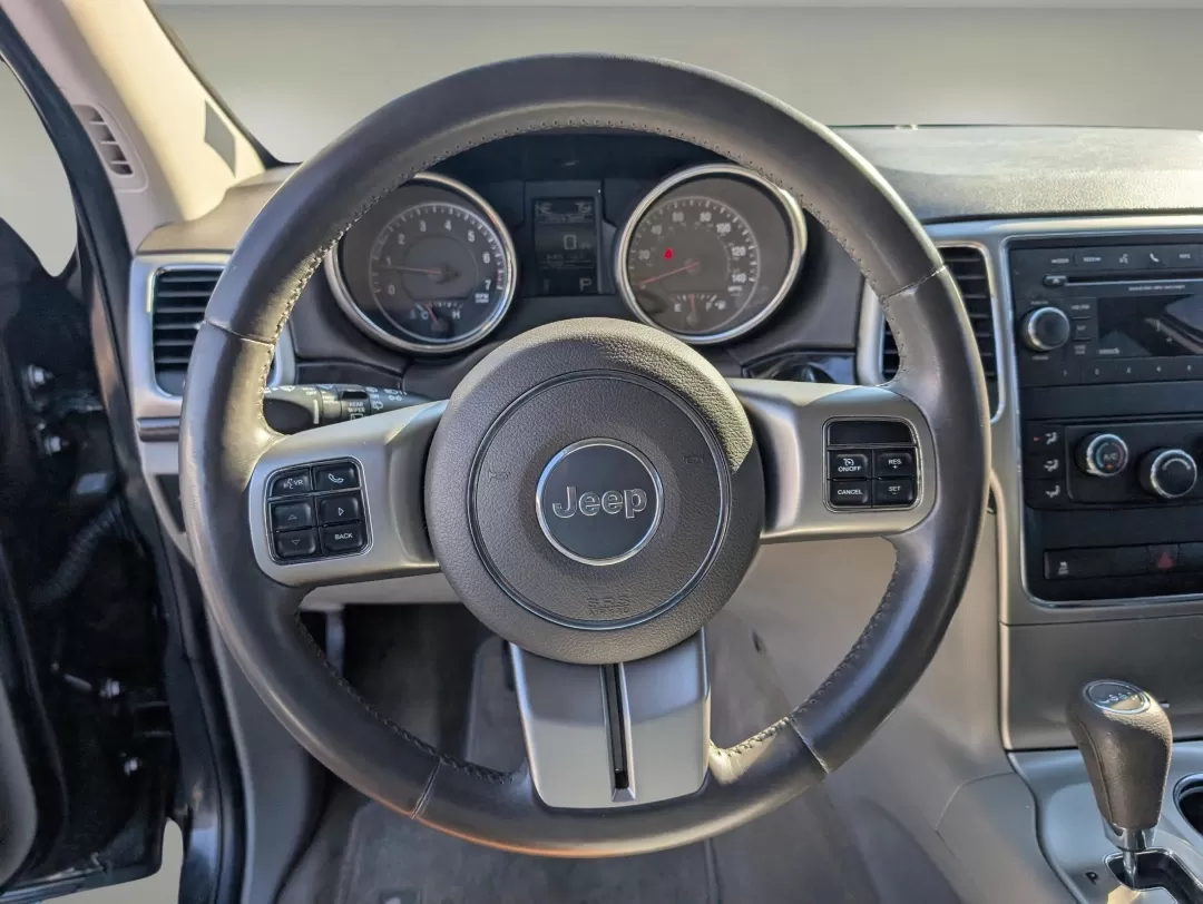 2012 /Dark Graystone/Medium Graystone Jeep Grand Cherokee Laredo (1C4RJFAG5CC) with an Other engine, located at 7000 Northlake Connector, Columbus, GA, 31904, (706) 987-8085, 32.524975, -84.978134 - **Adventure Awaits with This 2012 Jeep Grand Cherokee Laredo at Gils Auto - Your Local Buy Here Pay Here Dealership!**<br /> <br /> Are you ready to embark on your next adventure? The 2012 Jeep Grand Cherokee Laredo is the perfect companion for those who crave exploration and comfort. Whether you're - Photo#16
