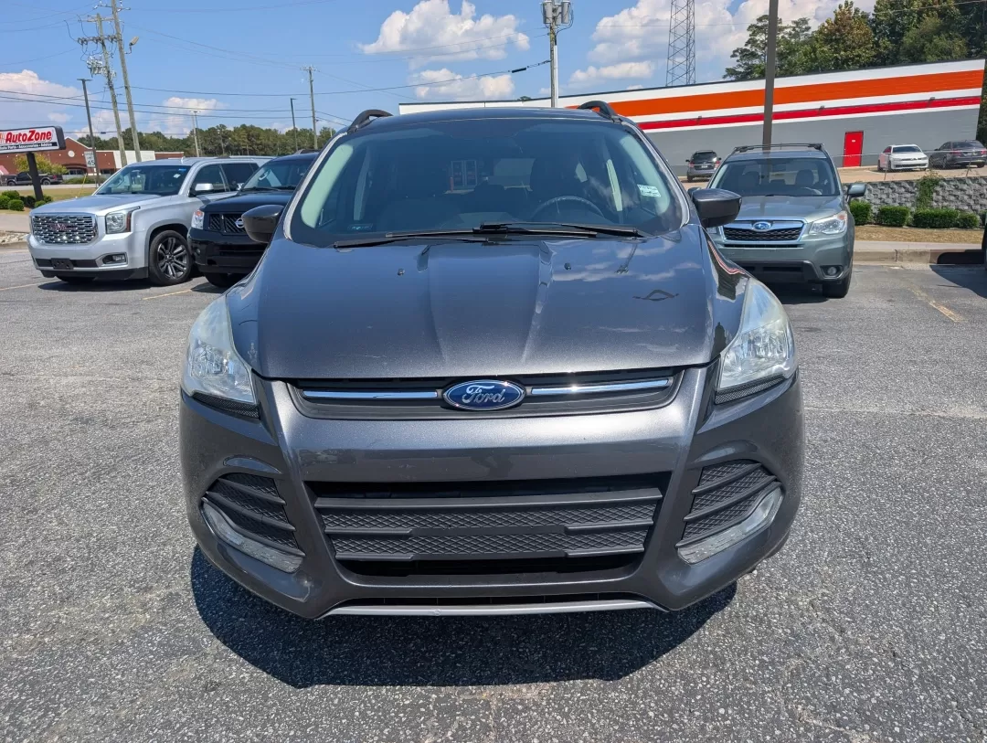 2016 Ford Escape SE (1FMCU0GX0GU) with an Other engine, located at 3959 U.S. 80 W, Phenix City, AL, 36870, (334) 297-4885, 32.469296, -85.135185 - Are you ready to elevate your daily commute or embark on weekend adventures without breaking the bank? Look no further than this 2016 Ford Escape SE, now available at Gils Auto in Phenix City, AL! This stylish sport utility vehicle is perfect for anyone seeking a reliable ride that marries comfort, - Photo#1