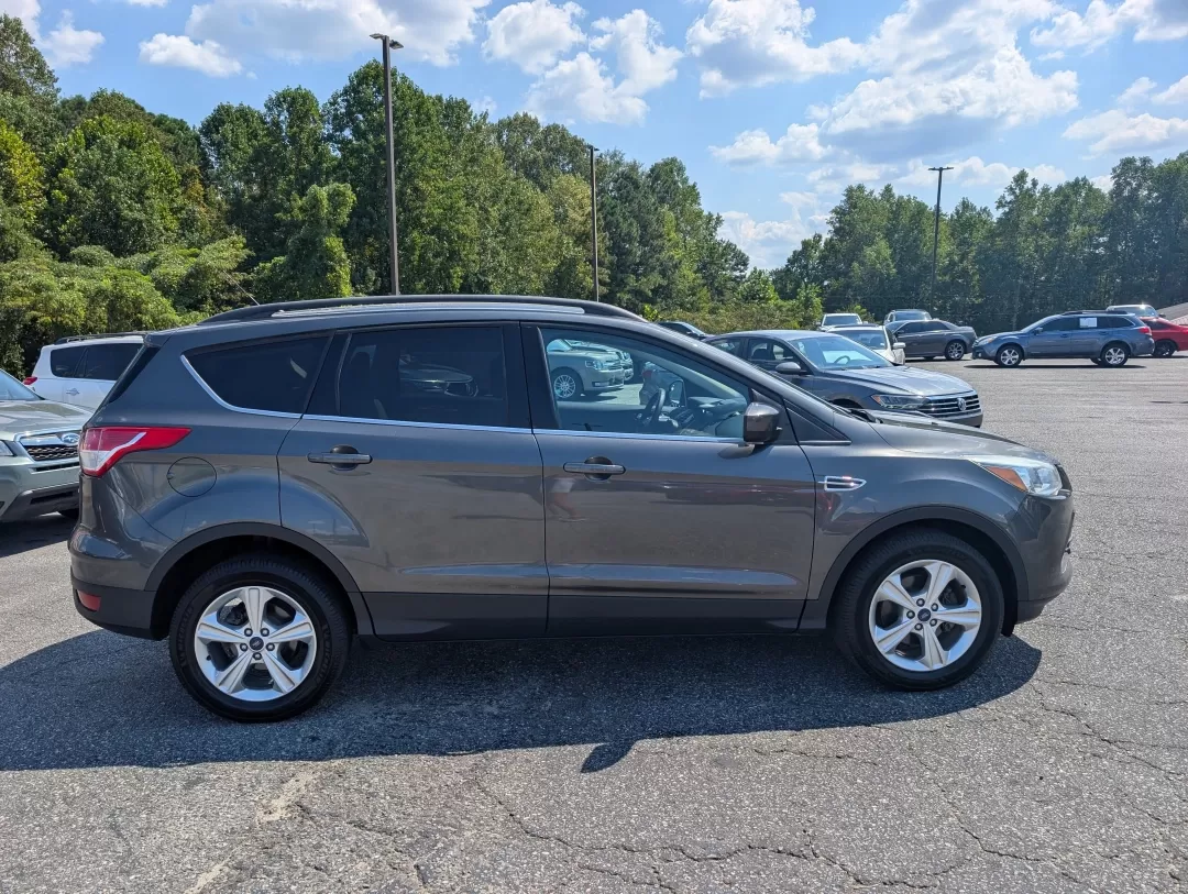 2016 Ford Escape SE (1FMCU0GX0GU) with an Other engine, located at 3959 U.S. 80 W, Phenix City, AL, 36870, (334) 297-4885, 32.469296, -85.135185 - Are you ready to elevate your daily commute or embark on weekend adventures without breaking the bank? Look no further than this 2016 Ford Escape SE, now available at Gils Auto in Phenix City, AL! This stylish sport utility vehicle is perfect for anyone seeking a reliable ride that marries comfort, - Photo#3