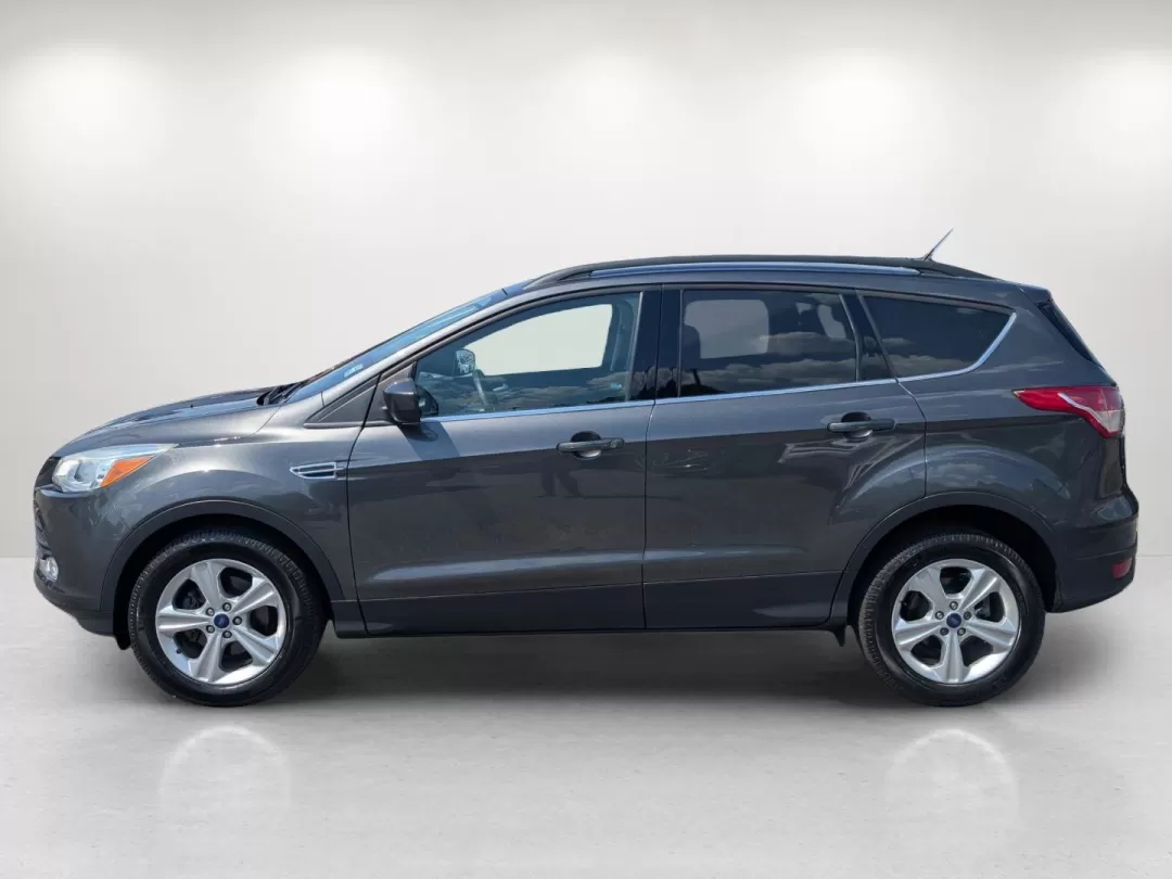 2016 Ford Escape SE (1FMCU0GX0GU) with an Other engine, located at 3959 U.S. 80 W, Phenix City, AL, 36870, (334) 297-4885, 32.469296, -85.135185 - Are you ready to elevate your daily commute or embark on weekend adventures without breaking the bank? Look no further than this 2016 Ford Escape SE, now available at Gils Auto in Phenix City, AL! This stylish sport utility vehicle is perfect for anyone seeking a reliable ride that marries comfort, - Photo#8