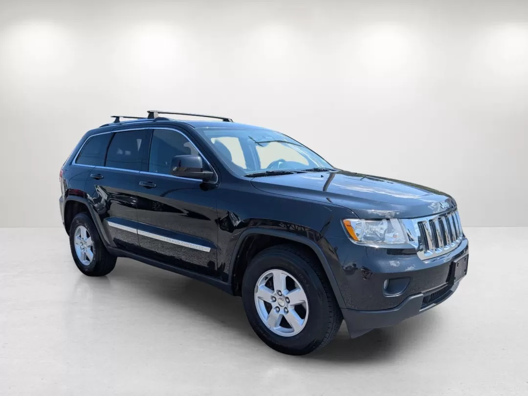 2013 /Black Jeep Grand Cherokee Laredo (1C4RJFAG5DC) with an Other engine, located at 804 22nd Ave, Phenix City, AL, 36870, (334) 297-1860, 32.484749, -85.024475 - Discover adventure and comfort with this versatile 2013 Jeep Grand Cherokee Laredo, perfect for families on the go or anyone seeking an exhilarating weekend escape. This Sport Utility Vehicle (SUV) effortlessly combines rugged performance with modern conveniences, making it an ideal choice for navig - Photo#2