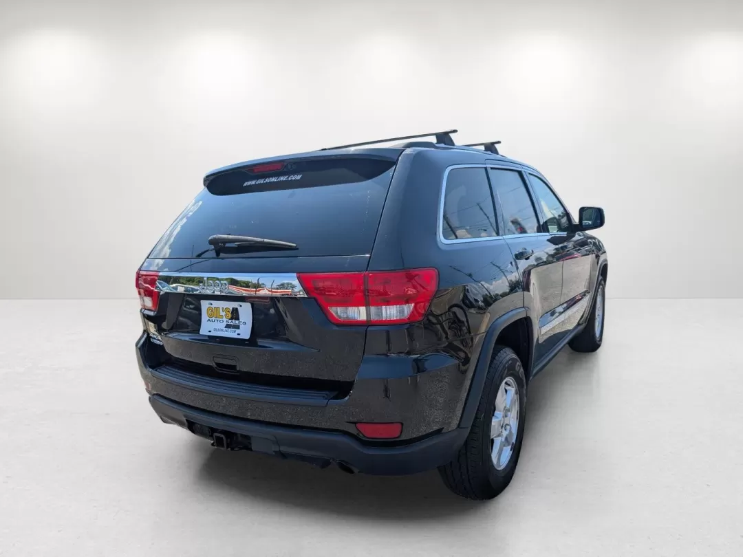 2013 /Black Jeep Grand Cherokee Laredo (1C4RJFAG5DC) with an Other engine, located at 804 22nd Ave, Phenix City, AL, 36870, (334) 297-1860, 32.484749, -85.024475 - Discover adventure and comfort with this versatile 2013 Jeep Grand Cherokee Laredo, perfect for families on the go or anyone seeking an exhilarating weekend escape. This Sport Utility Vehicle (SUV) effortlessly combines rugged performance with modern conveniences, making it an ideal choice for navig - Photo#4