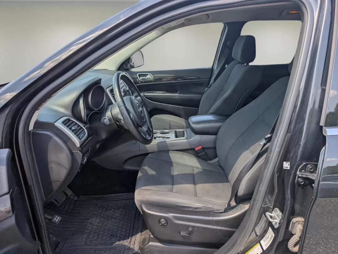 2013 /Black Jeep Grand Cherokee Laredo (1C4RJFAG5DC) with an Other engine, located at 804 22nd Ave, Phenix City, AL, 36870, (334) 297-1860, 32.484749, -85.024475 - Discover adventure and comfort with this versatile 2013 Jeep Grand Cherokee Laredo, perfect for families on the go or anyone seeking an exhilarating weekend escape. This Sport Utility Vehicle (SUV) effortlessly combines rugged performance with modern conveniences, making it an ideal choice for navig - Photo#9