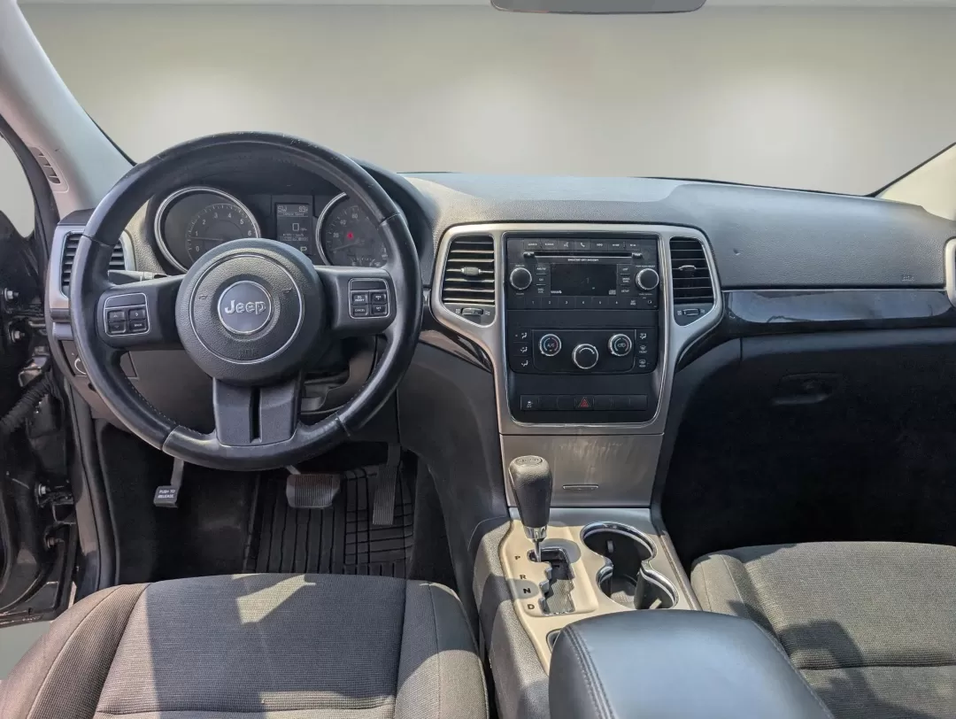 2013 /Black Jeep Grand Cherokee Laredo (1C4RJFAG5DC) with an Other engine, located at 804 22nd Ave, Phenix City, AL, 36870, (334) 297-1860, 32.484749, -85.024475 - Discover adventure and comfort with this versatile 2013 Jeep Grand Cherokee Laredo, perfect for families on the go or anyone seeking an exhilarating weekend escape. This Sport Utility Vehicle (SUV) effortlessly combines rugged performance with modern conveniences, making it an ideal choice for navig - Photo#11