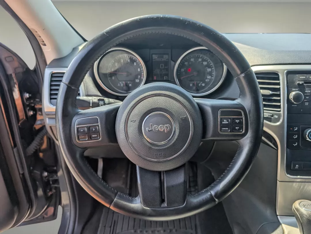 2013 /Black Jeep Grand Cherokee Laredo (1C4RJFAG5DC) with an Other engine, located at 804 22nd Ave, Phenix City, AL, 36870, (334) 297-1860, 32.484749, -85.024475 - Discover adventure and comfort with this versatile 2013 Jeep Grand Cherokee Laredo, perfect for families on the go or anyone seeking an exhilarating weekend escape. This Sport Utility Vehicle (SUV) effortlessly combines rugged performance with modern conveniences, making it an ideal choice for navig - Photo#15