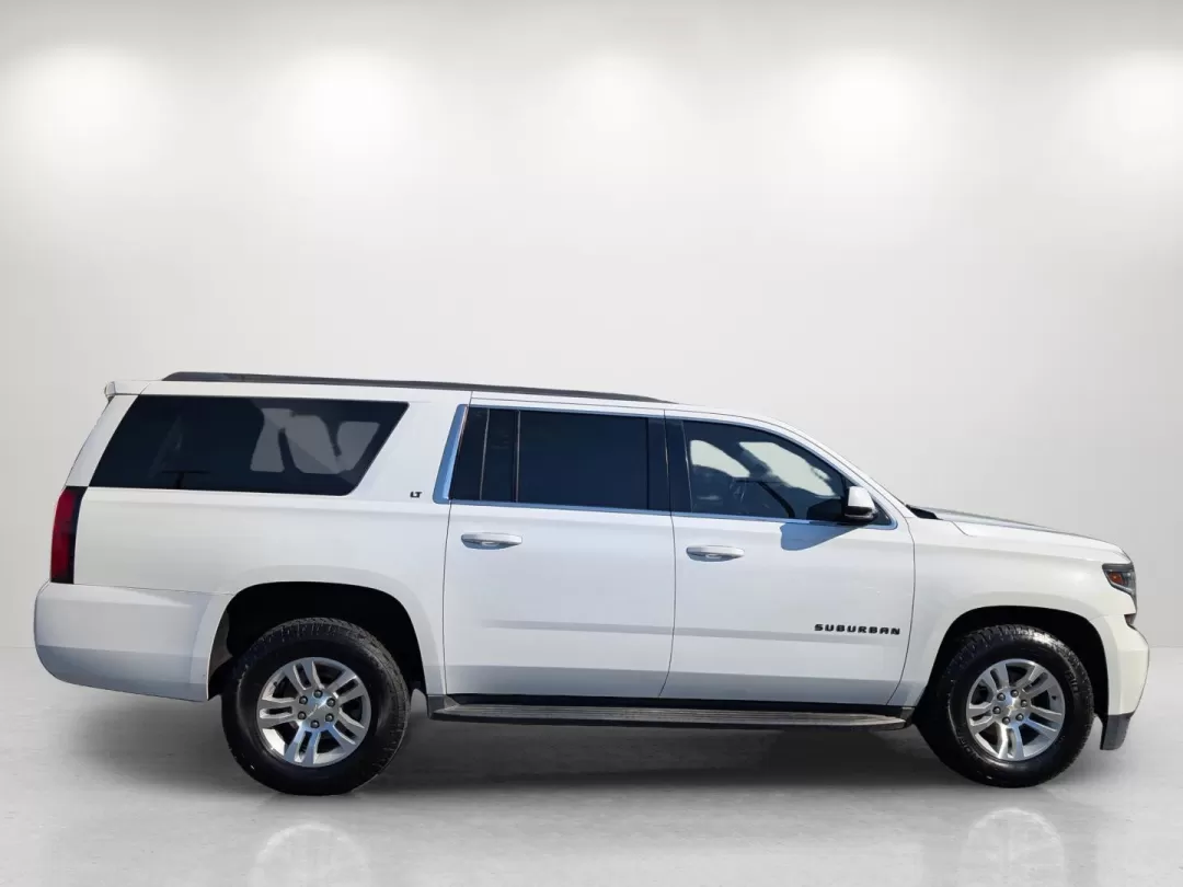 2017 /Jet Black/Dark Ash Chevrolet Suburban LT (1GNSCHKC8HR) with an Other engine, located at 3959 U.S. 80 W, Phenix City, AL, 36870, (334) 297-4885, 32.469296, -85.135185 - Are you ready for unforgettable family adventures and safe commutes in a vehicle that checks all the boxes? Look no further than this stunning 2017 Chevrolet Suburban LT, available now at Gils Auto in Phenix City, AL. With its spacious interior, advanced technology, and remarkable performance, this - Photo#4