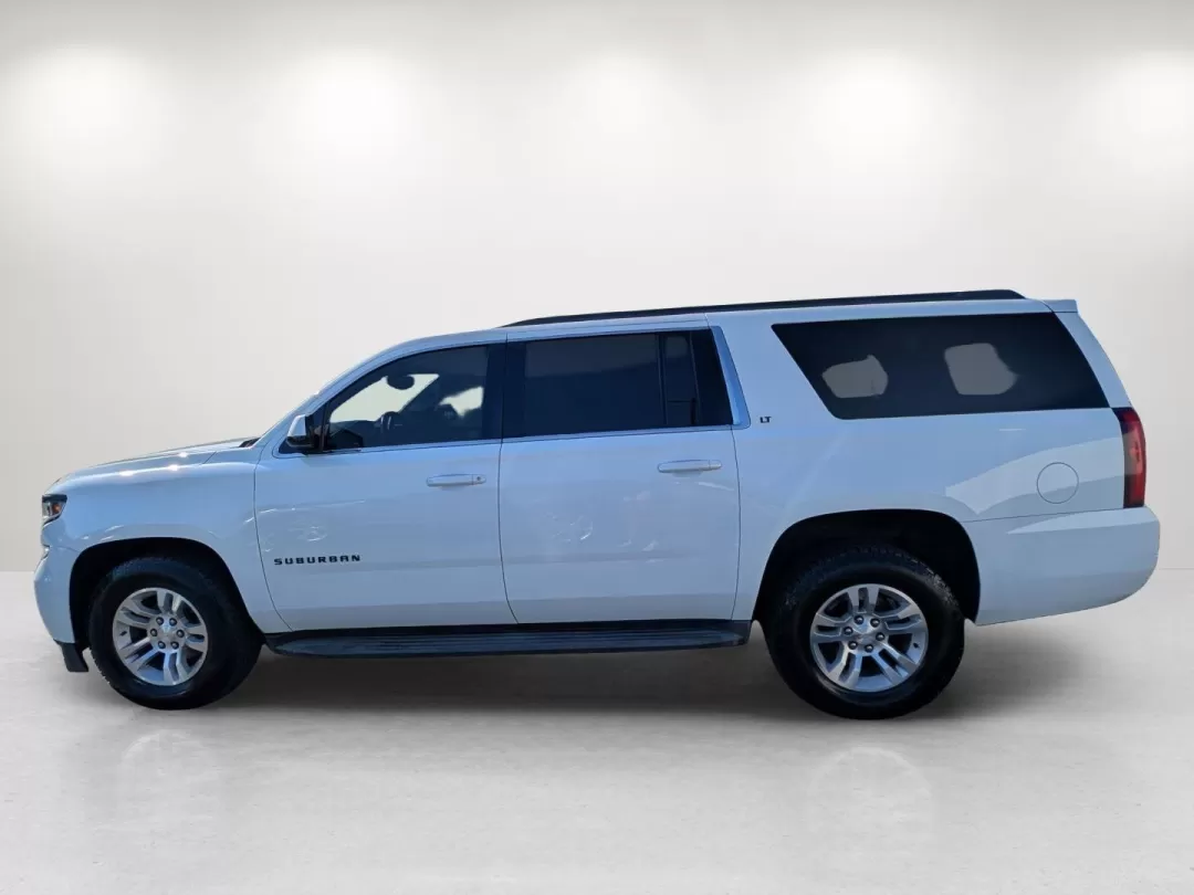 2017 /Jet Black/Dark Ash Chevrolet Suburban LT (1GNSCHKC8HR) with an Other engine, located at 3959 U.S. 80 W, Phenix City, AL, 36870, (334) 297-4885, 32.469296, -85.135185 - Are you ready for unforgettable family adventures and safe commutes in a vehicle that checks all the boxes? Look no further than this stunning 2017 Chevrolet Suburban LT, available now at Gils Auto in Phenix City, AL. With its spacious interior, advanced technology, and remarkable performance, this - Photo#8