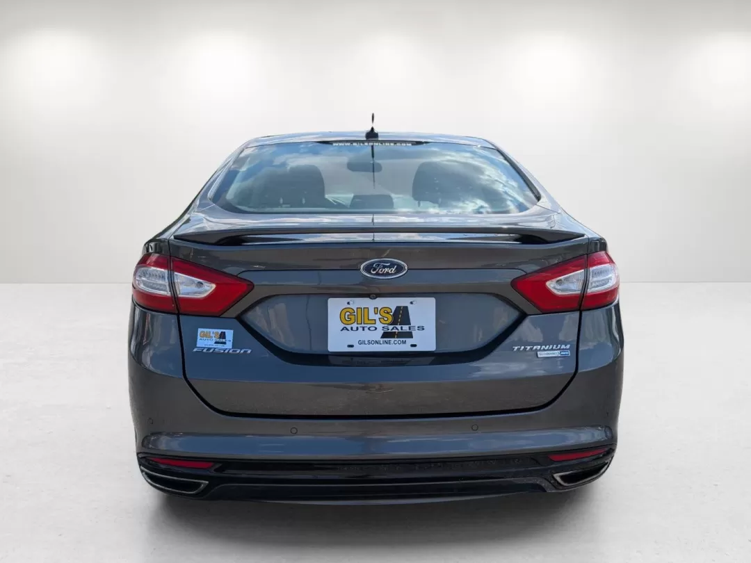 2015 Ford Fusion Titanium (3FA6P0D91FR) with an Other engine, located at 804 22nd Ave, Phenix City, AL, 36870, (334) 297-1860, 32.484749, -85.024475 - Are you ready to elevate your daily commute and weekend adventures? Look no further! At Gils Auto in Phenix City, AL, we're excited to present a fantastic opportunity to own a 2015 Ford Fusion Titanium. This stylish sedan is perfect for those who seek a reliable vehicle that seamlessly fits into an - Photo#5