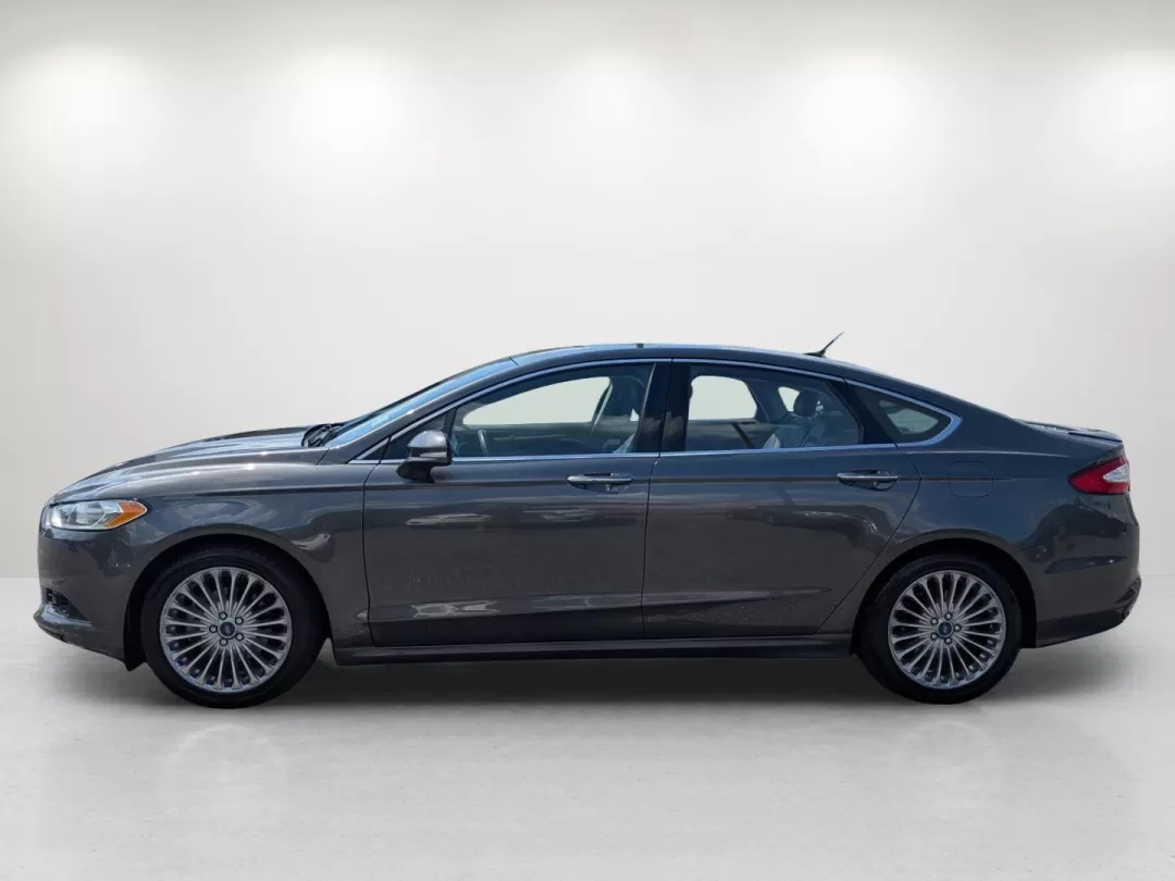 2015 Ford Fusion Titanium (3FA6P0D91FR) with an Other engine, located at 804 22nd Ave, Phenix City, AL, 36870, (334) 297-1860, 32.484749, -85.024475 - Are you ready to elevate your daily commute and weekend adventures? Look no further! At Gils Auto in Phenix City, AL, we're excited to present a fantastic opportunity to own a 2015 Ford Fusion Titanium. This stylish sedan is perfect for those who seek a reliable vehicle that seamlessly fits into an - Photo#7