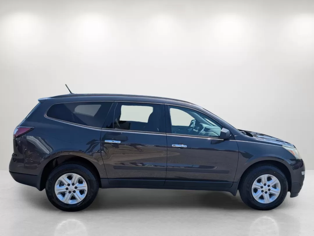 2015 /Dark Titanium/Light Titanium Chevrolet Traverse LS (1GNKRFEDXFJ) with an Other engine, located at 3959 U.S. 80 W, Phenix City, AL, 36870, (334) 297-4885, 32.469296, -85.135185 - **Discover Your Next Adventure with the 2015 Chevrolet Traverse LS at Gils Auto!**<br /> <br /> Are you ready to elevate your family's adventures or conquer your daily commute? The 2015 Chevrolet Traverse LS is your answer, designed with ample space and modern features to accommodate every need. Fro - Photo#4