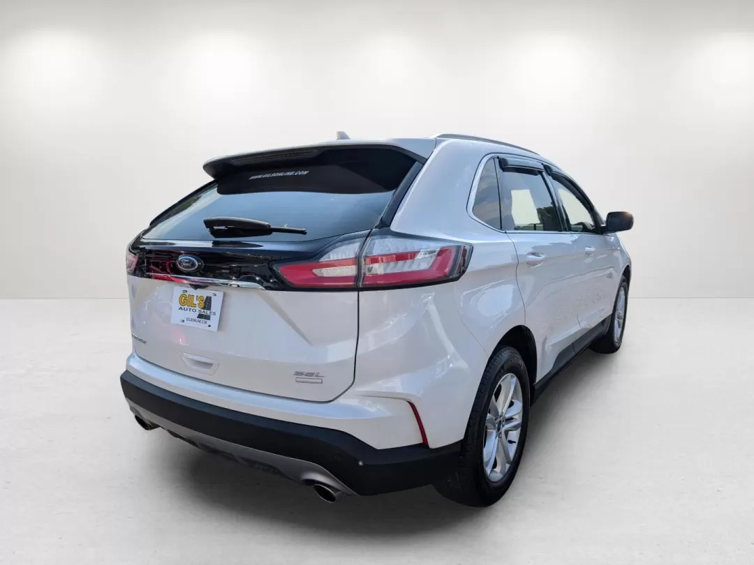 2019 Ford Edge SEL (2FMPK3J99KB) with an Other engine, located at 3959 U.S. 80 W, Phenix City, AL, 36870, (334) 297-4885, 32.469296, -85.135185 - Are you in the market for a versatile SUV that enhances your daily commute while accommodating weekend adventures? Look no further! At Gils Auto, located at 3959 U.S. 80 W, Phenix City, AL 36870, we proudly present this stunning 2019 Ford Edge SEL. With a perfect blend of style, comfort, and advance - Photo#5