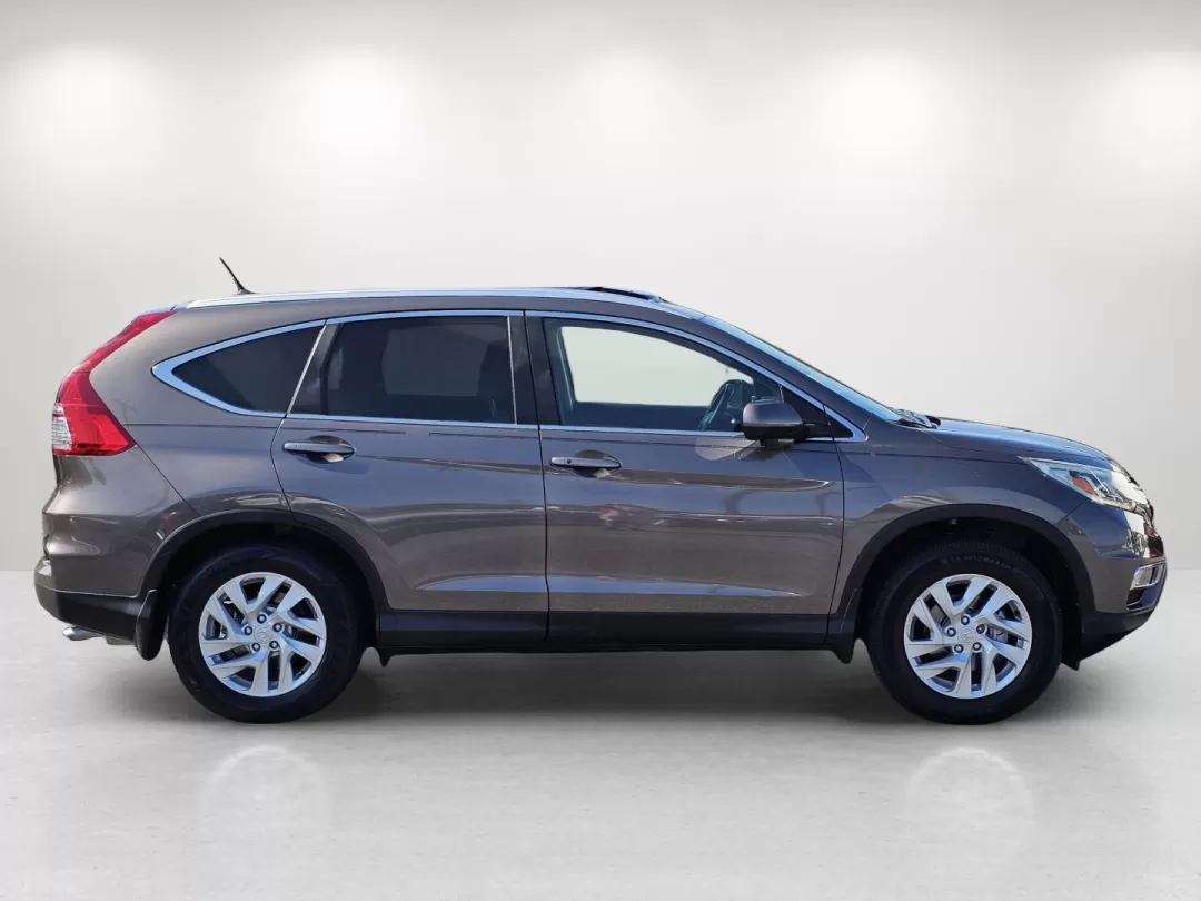 2015 Honda CR-V EX-L (2HKRM3H75FH) with an Other engine, located at 5115 14th Ave., Columbus, GA, 31904, (706) 323-0345, 32.511494, -84.971046 - **Explore Life's Adventures in This 2015 Honda CR-V EX-L at Gils Auto - Phenix City!**<br /> <br /> Are you ready to elevate your daily drive or embark on memorable weekend adventures? The 2015 Honda CR-V EX-L is your perfect companion, offering a blend of efficiency, comfort, and style that caters - Photo#3