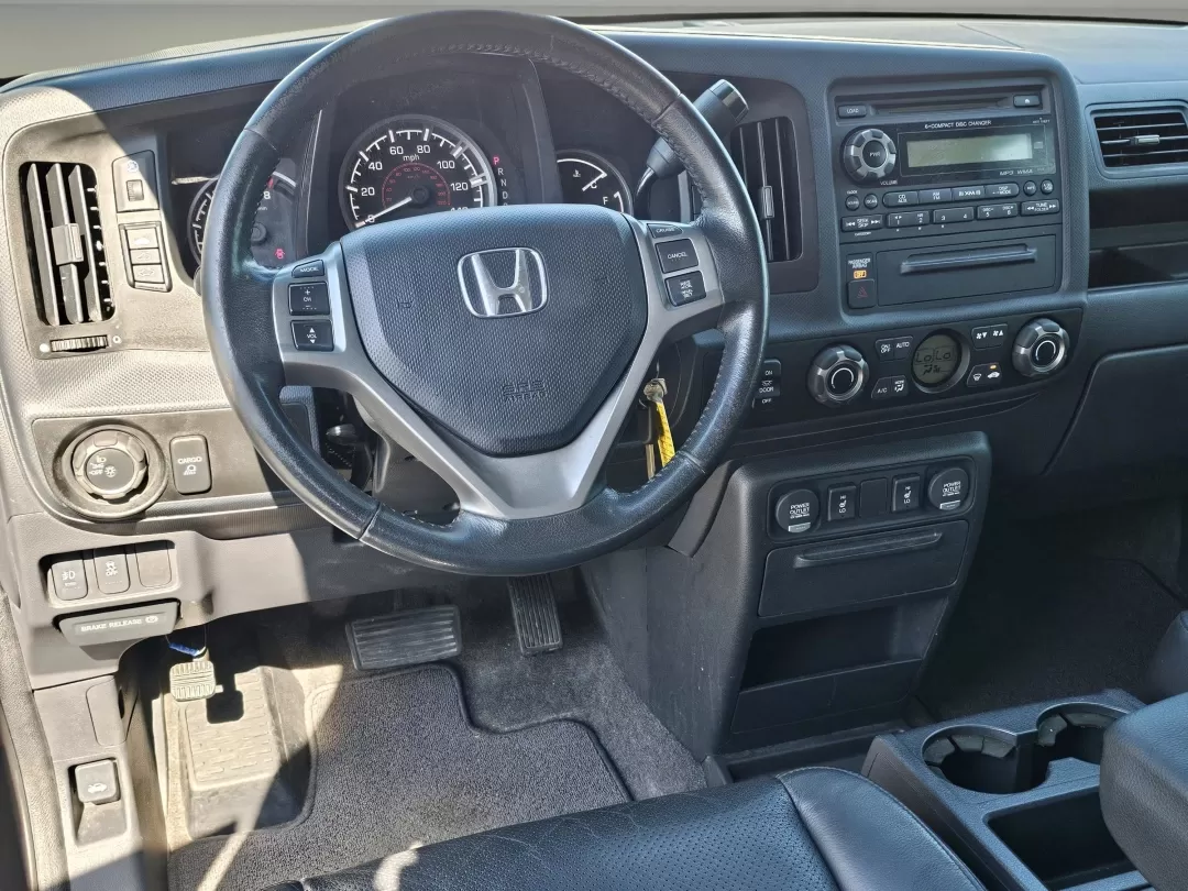 2012 Honda Ridgeline RTL (5FPYK1F56CB) with an Other engine, located at 3959 U.S. 80 W, Phenix City, AL, 36870, (334) 297-4885, 32.469296, -85.135185 - **Unleash Your Adventure with the 2012 Honda Ridgeline RTL Perfect for Every Journey!**<br /> <br /> Are you ready to take your weekend adventures to the next level or seamlessly manage your daily commute? Look no further than Gils Auto in Phenix City, AL! Our 2012 Honda Ridgeline RTL is the ultima - Photo#16