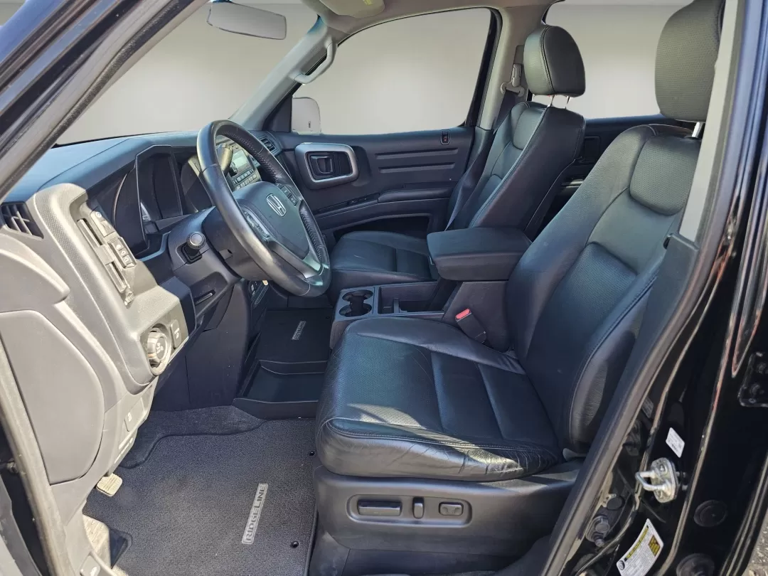 2012 Honda Ridgeline RTL (5FPYK1F56CB) with an Other engine, located at 1430 Gateway Drive, Opelika, AL, 36801, (334) 239-0944, 32.637871, -85.409790 - **Unleash Your Adventure with the 2012 Honda Ridgeline RTL Perfect for Every Journey!**<br /> <br /> Are you ready to take your weekend adventures to the next level or seamlessly manage your daily commute? Look no further than Gils Auto in Phenix City, AL! Our 2012 Honda Ridgeline RTL is the ultima - Photo#9