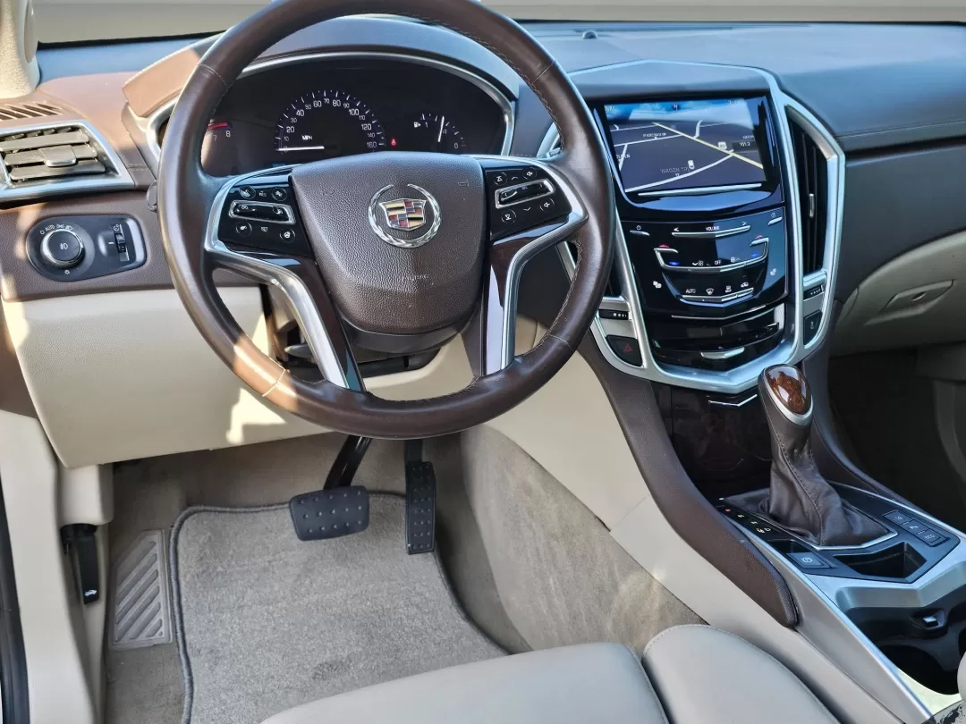 2016 /Shale with Brownstone accents Cadillac SRX Performance Collection (3GYFNCE37GS) with an Other engine, located at 3959 U.S. 80 W, Phenix City, AL, 36870, (334) 297-4885, 32.469296, -85.135185 - Looking for a vehicle that perfectly blends luxury and capability for your next adventure? The 2016 Cadillac SRX Performance Collection is the ideal SUV for those seeking comfort and style, whether you're navigating the bustling streets of Phenix City or heading out for a weekend getaway to Lake Har - Photo#16