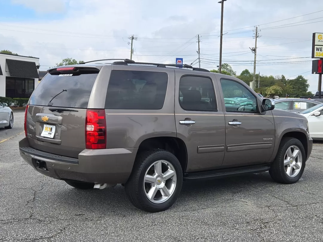 2014 /Light Cashmere/Dark Cashmere Chevrolet Tahoe LT (1GNSCBE07ER) with an Other engine, located at 3959 U.S. 80 W, Phenix City, AL, 36870, (334) 297-4885, 32.469296, -85.135185 - ### Embrace Adventure with the 2014 Chevrolet Tahoe LT at Gils Auto!<br /> <br /> Are you ready to elevate your driving experience? Whether you're carting the kids to school, embarking on weekend getaways, or simply cruising through Phenix City, the 2014 Chevrolet Tahoe LT is the perfect companion f - Photo#5