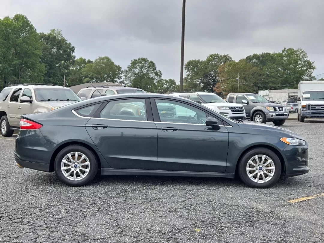 2015 Ford Fusion S (1FA6P0G72F5) with an Other engine, located at 3959 U.S. 80 W, Phenix City, AL, 36870, (334) 297-4885, 32.469296, -85.135185 - Experience the thrill of driving with this 2015 Ford Fusion S, an ideal sedan for those seeking a perfect blend of style, comfort, and fuel efficiency. Whether you're commuting to work in downtown Phenix City or taking a weekend road trip to nearby hotspots like Lake Harding, this vehicle is designe - Photo#4