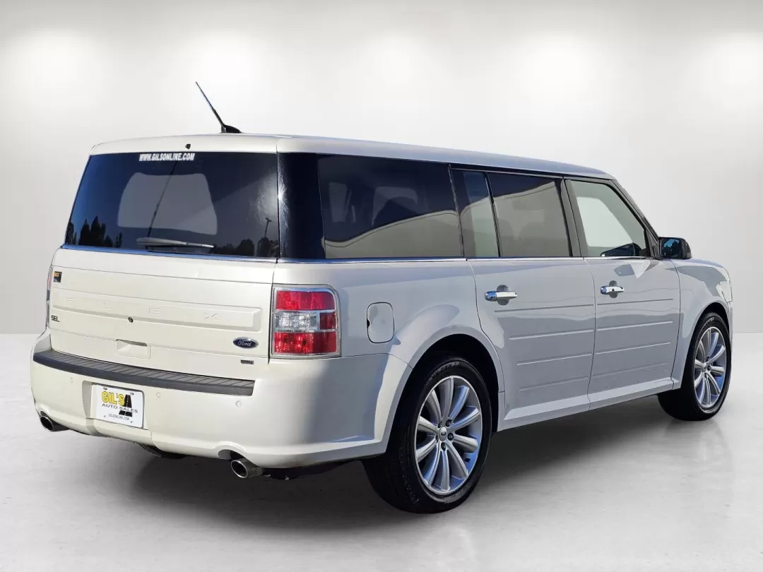 2015 Ford Flex SEL (2FMHK6C84FB) with an Other engine, located at 7000 Northlake Connector, Columbus, GA, 31904, (706) 987-8085, 32.524975, -84.978134 - **Discover Adventure with the 2015 Ford Flex SEL at Gils Auto!**<br /> <br /> Are you looking for a versatile vehicle that perfectly complements your active lifestyle? Whether you're a growing family, a weekend adventurer, or someone who simply enjoys the spaciousness of a well-designed crossover, t - Photo#4
