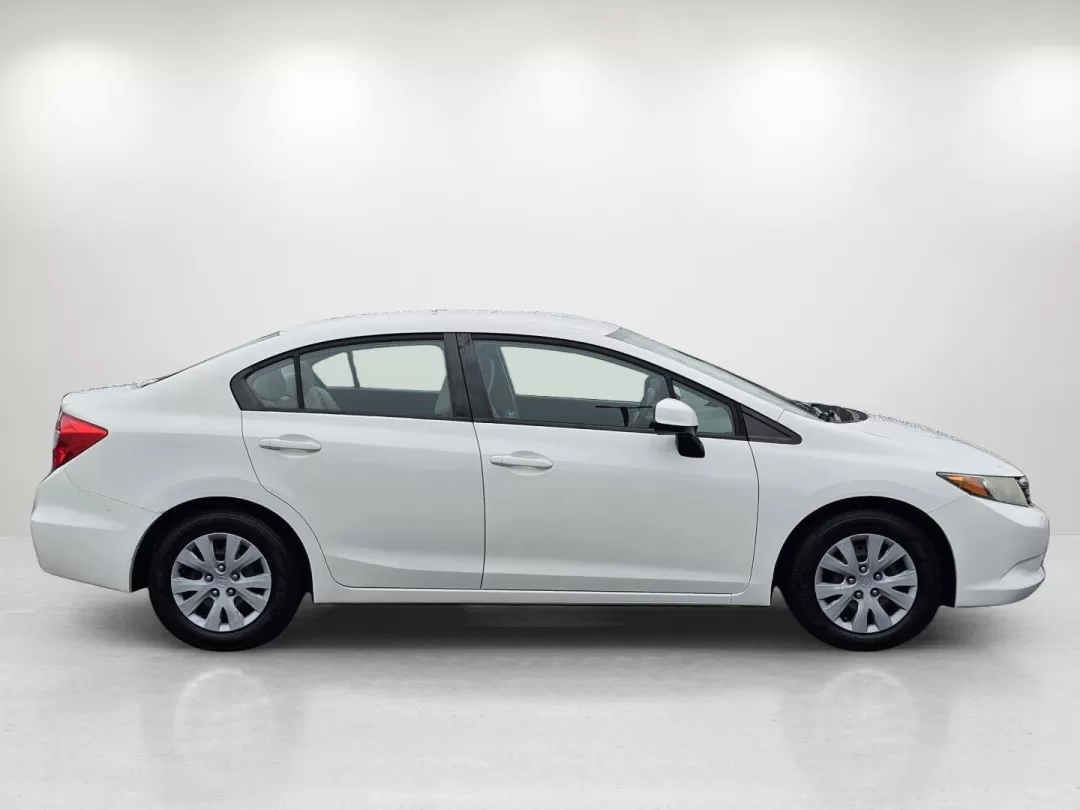 2012 Honda Civic Sdn LX (2HGFB2F5XCH) with an Other engine, located at 3959 U.S. 80 W, Phenix City, AL, 36870, (334) 297-4885, 32.469296, -85.135185 - Discover your next adventure in the sleek and efficient 2012 Honda Civic Sdn LX, available now at Gils Auto in Phenix City, AL. This remarkable sedan is not just a vehicle; it's a lifestyle choice, perfect for individuals and families looking for reliability, comfort, and style. Whether you're navig - Photo#4