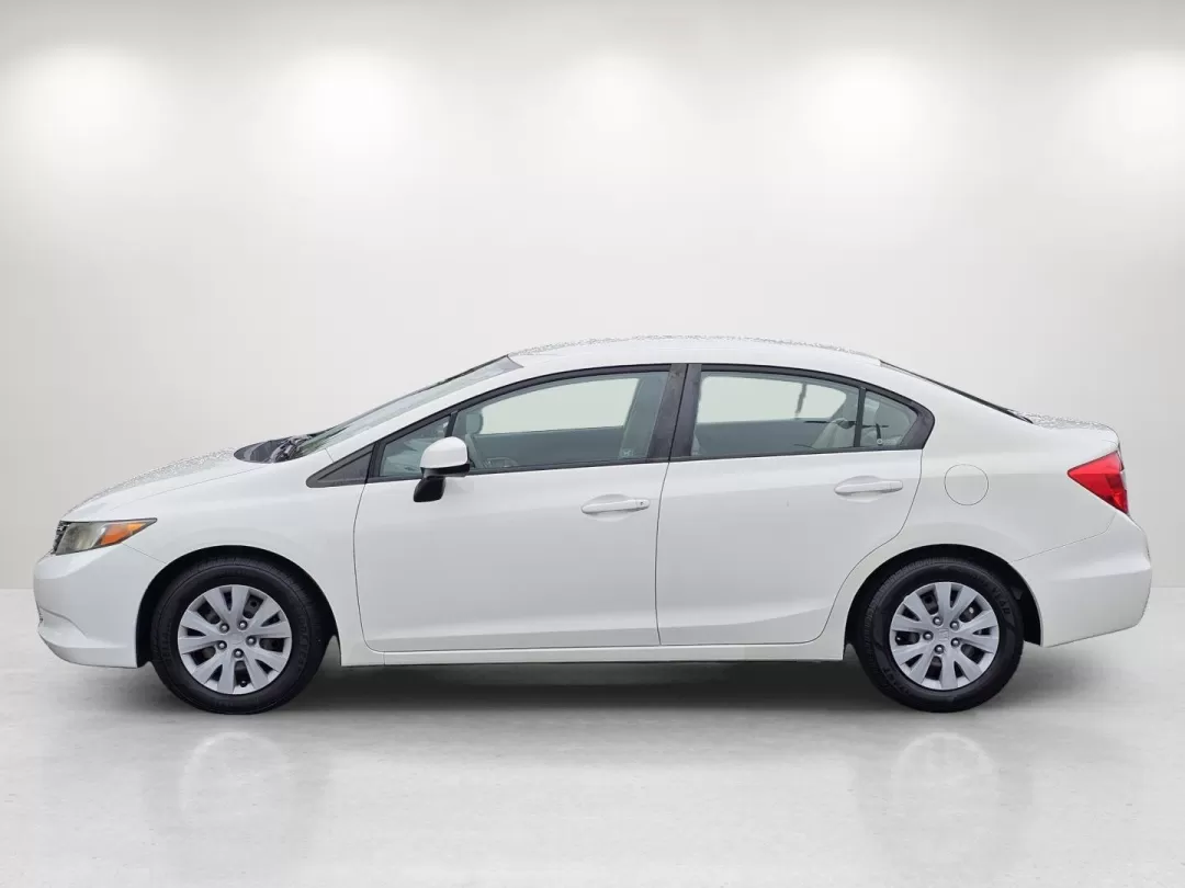 2012 Honda Civic Sdn LX (2HGFB2F5XCH) with an Other engine, located at 3959 U.S. 80 W, Phenix City, AL, 36870, (334) 297-4885, 32.469296, -85.135185 - Discover your next adventure in the sleek and efficient 2012 Honda Civic Sdn LX, available now at Gils Auto in Phenix City, AL. This remarkable sedan is not just a vehicle; it's a lifestyle choice, perfect for individuals and families looking for reliability, comfort, and style. Whether you're navig - Photo#8