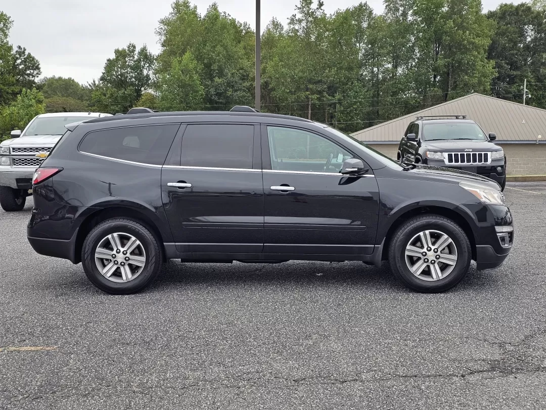 2015 /Ebony Chevrolet Traverse LT (1GNKRHKDXFJ) with an Other engine, located at 5115 14th Ave., Columbus, GA, 31904, (706) 323-0345, 32.511494, -84.971046 - **Elevate Your Family Adventures with the 2015 Chevrolet Traverse LT at Gils Auto!**<br /> <br /> Are you searching for the perfect family SUV that combines space, comfort, and the latest technology? Look no further than this 2015 Chevrolet Traverse LT, now available at Gils Auto in Phenix City, AL. - Photo#3