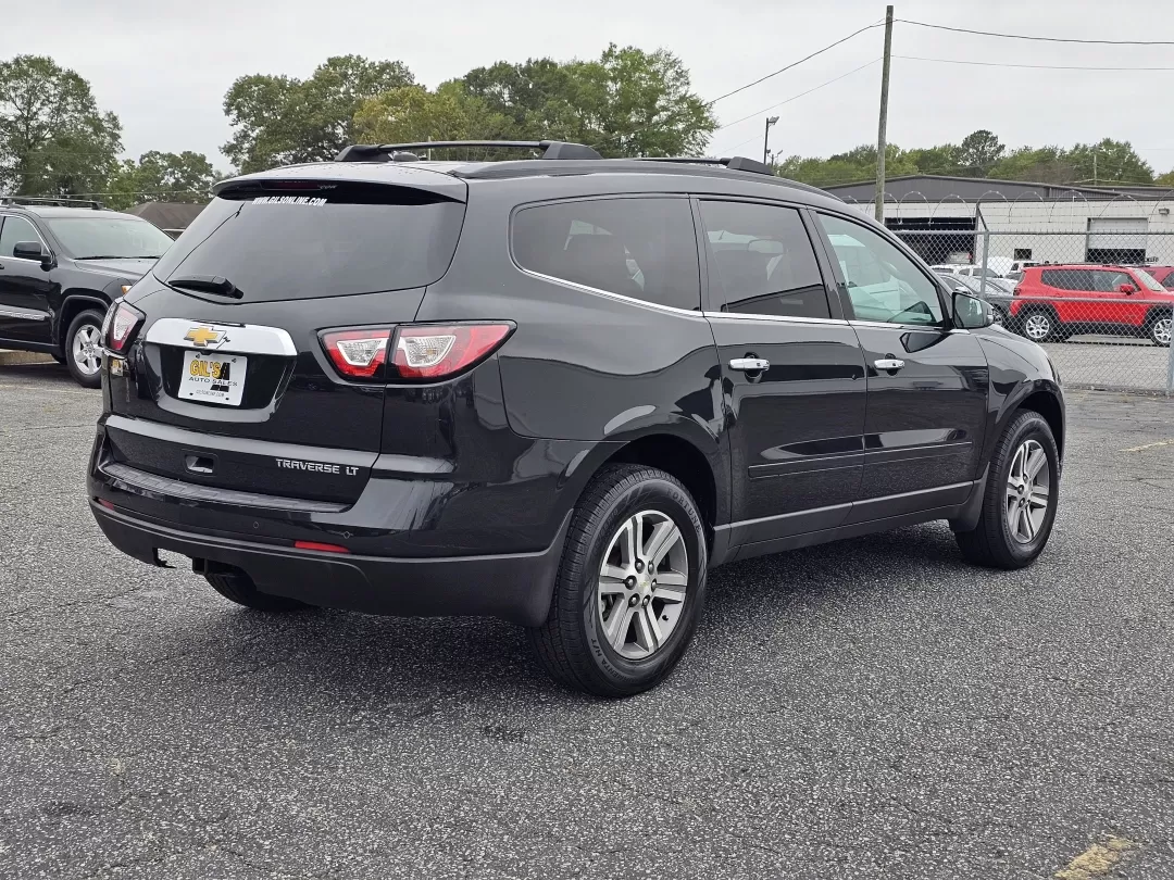 2015 /Ebony Chevrolet Traverse LT (1GNKRHKDXFJ) with an Other engine, located at 5115 14th Ave., Columbus, GA, 31904, (706) 323-0345, 32.511494, -84.971046 - **Elevate Your Family Adventures with the 2015 Chevrolet Traverse LT at Gils Auto!**<br /> <br /> Are you searching for the perfect family SUV that combines space, comfort, and the latest technology? Look no further than this 2015 Chevrolet Traverse LT, now available at Gils Auto in Phenix City, AL. - Photo#4
