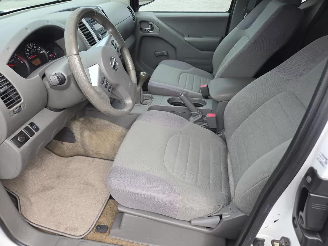 2015 /Steel Nissan Frontier S (1N6BD0CTXFN) with an Other engine, located at 3959 U.S. 80 W, Phenix City, AL, 36870, (334) 297-4885, 32.469296, -85.135185 - **Elevate Your Adventures with the 2015 Nissan Frontier at Gils Auto - Phenix City!** <br /> <br /> Are you searching for a reliable, rugged truck that effortlessly fits into your active lifestyle? Look no further than the 2015 Nissan Frontier, available now at Gils Auto in Phenix City, AL. Ideal fo - Photo#10