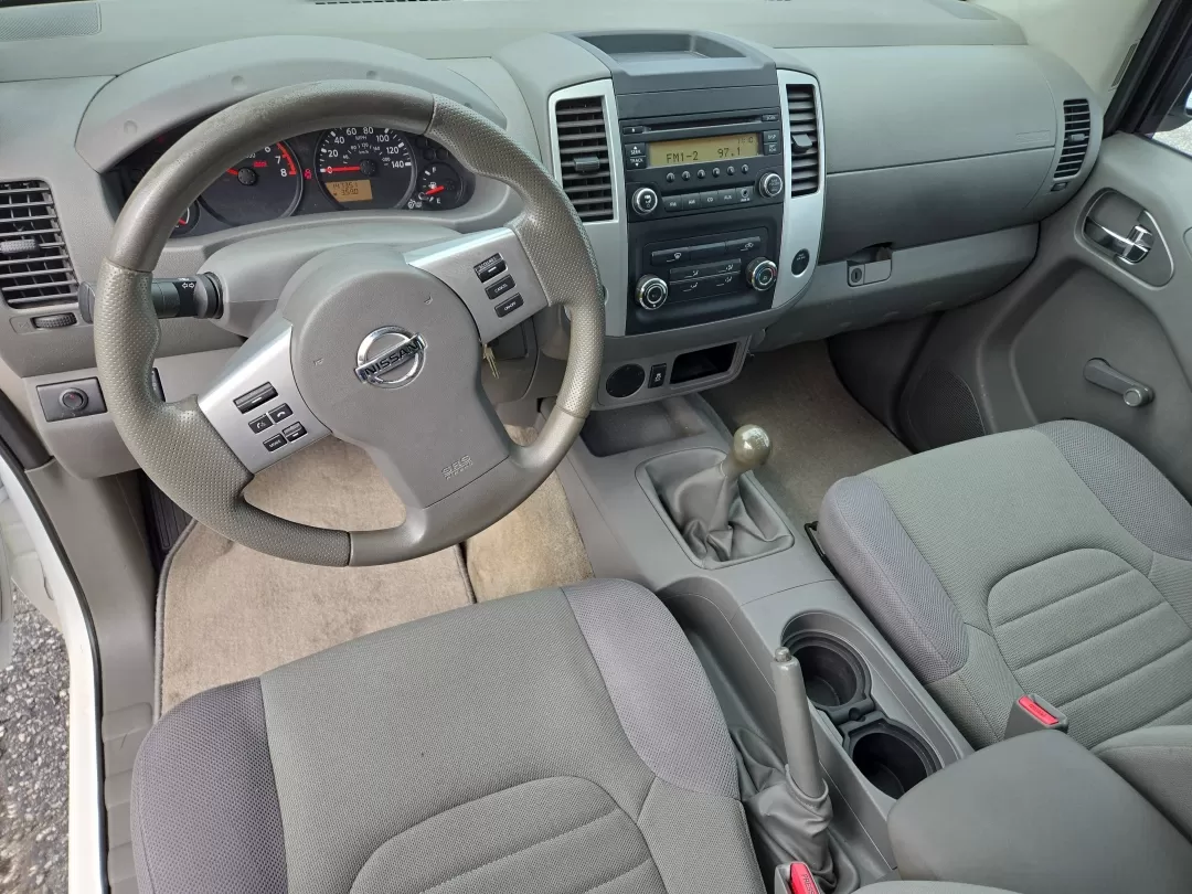 2015 /Steel Nissan Frontier S (1N6BD0CTXFN) with an Other engine, located at 3959 U.S. 80 W, Phenix City, AL, 36870, (334) 297-4885, 32.469296, -85.135185 - **Elevate Your Adventures with the 2015 Nissan Frontier at Gils Auto - Phenix City!** <br /> <br /> Are you searching for a reliable, rugged truck that effortlessly fits into your active lifestyle? Look no further than the 2015 Nissan Frontier, available now at Gils Auto in Phenix City, AL. Ideal fo - Photo#13