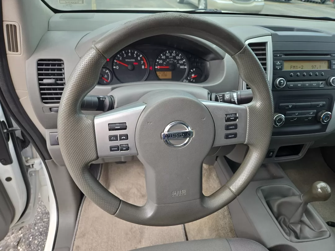 2015 /Steel Nissan Frontier S (1N6BD0CTXFN) with an Other engine, located at 3959 U.S. 80 W, Phenix City, AL, 36870, (334) 297-4885, 32.469296, -85.135185 - **Elevate Your Adventures with the 2015 Nissan Frontier at Gils Auto - Phenix City!** <br /> <br /> Are you searching for a reliable, rugged truck that effortlessly fits into your active lifestyle? Look no further than the 2015 Nissan Frontier, available now at Gils Auto in Phenix City, AL. Ideal fo - Photo#14