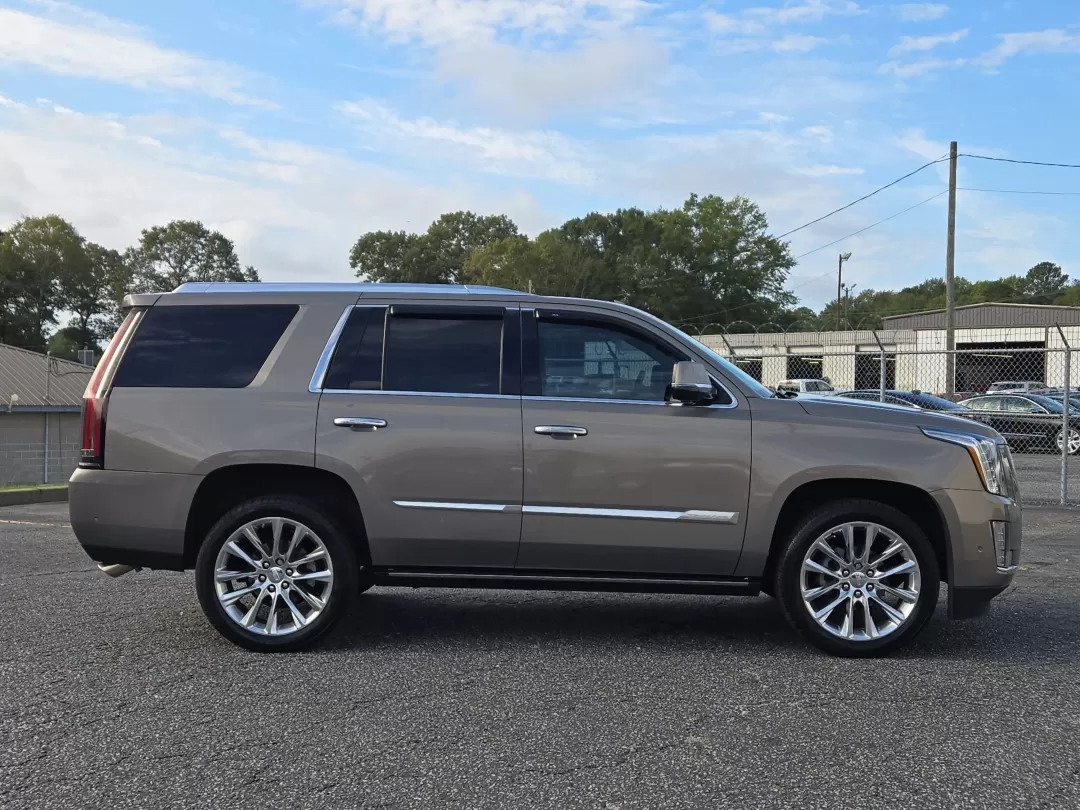 2017 /Shale with Cocoa Accents Cadillac Escalade Premium Luxury (1GYS3CKJ9HR) with an Other engine, located at 3959 U.S. 80 W, Phenix City, AL, 36870, (334) 297-4885, 32.469296, -85.135185 - Unleash your adventurous spirit with the stunning 2017 Cadillac Escalade Premium Luxury, now available at Gils Auto in Phenix City, AL. This SUV is not just a mode of transportation; it's a lifestyle choice perfect for families, weekend warriors, and those who appreciate the finer things in life. Wh - Photo#4