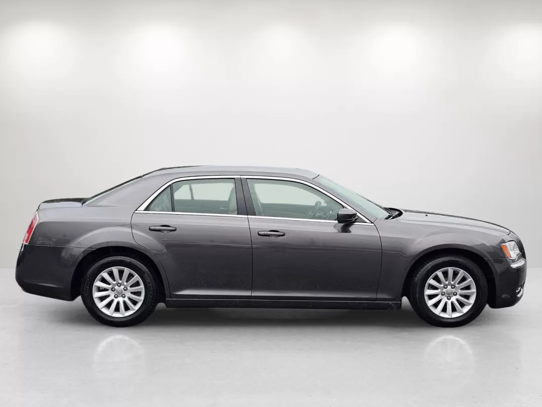 2014 /Lt Frost Beige/Black Chrysler 300 (2C3CCAAG0EH) with an Other engine, located at 3959 U.S. 80 W, Phenix City, AL, 36870, (334) 297-4885, 32.469296, -85.135185 - Discover the perfect blend of comfort, style, and performance with this stunning 2014 Chrysler 300, available now at Gils Auto in Phenix City, AL! Whether you're commuting to work, heading out for a weekend adventure, or simply running errands, this elegant sedan is designed to elevate your driving - Photo#4