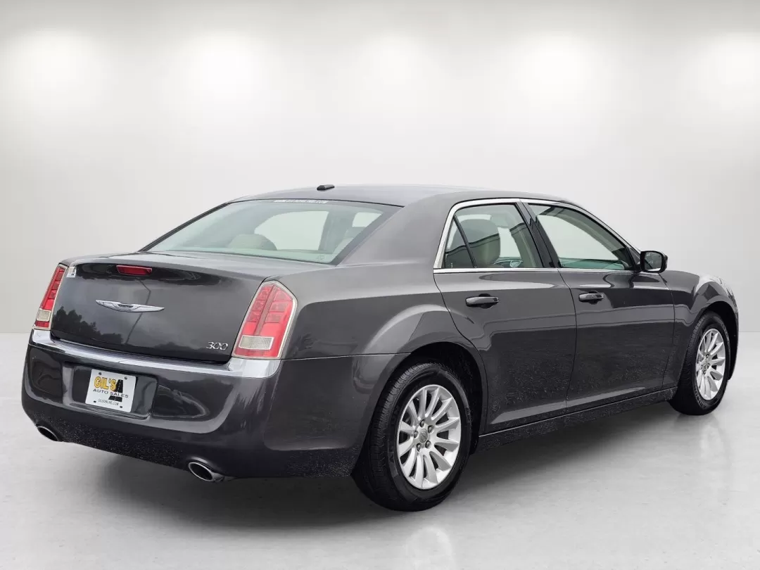 2014 /Lt Frost Beige/Black Chrysler 300 (2C3CCAAG0EH) with an Other engine, located at 3959 U.S. 80 W, Phenix City, AL, 36870, (334) 297-4885, 32.469296, -85.135185 - Discover the perfect blend of comfort, style, and performance with this stunning 2014 Chrysler 300, available now at Gils Auto in Phenix City, AL! Whether you're commuting to work, heading out for a weekend adventure, or simply running errands, this elegant sedan is designed to elevate your driving - Photo#5