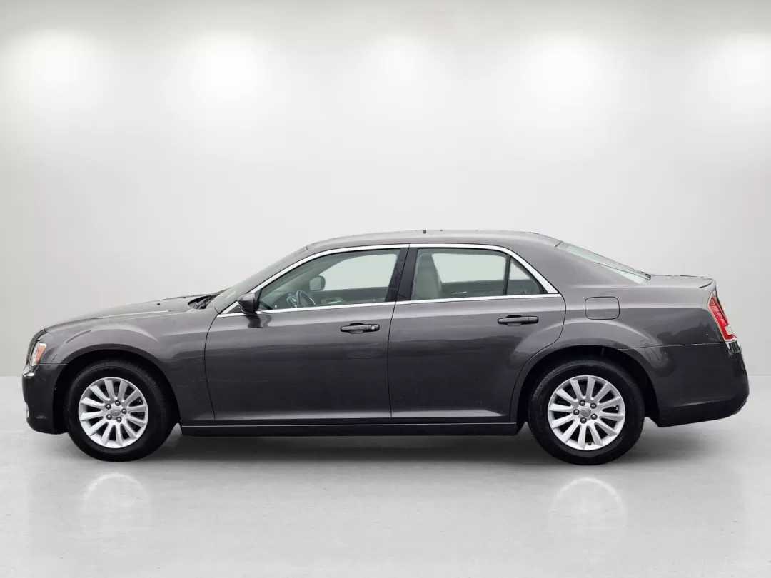 2014 /Lt Frost Beige/Black Chrysler 300 (2C3CCAAG0EH) with an Other engine, located at 3959 U.S. 80 W, Phenix City, AL, 36870, (334) 297-4885, 32.469296, -85.135185 - Discover the perfect blend of comfort, style, and performance with this stunning 2014 Chrysler 300, available now at Gils Auto in Phenix City, AL! Whether you're commuting to work, heading out for a weekend adventure, or simply running errands, this elegant sedan is designed to elevate your driving - Photo#8