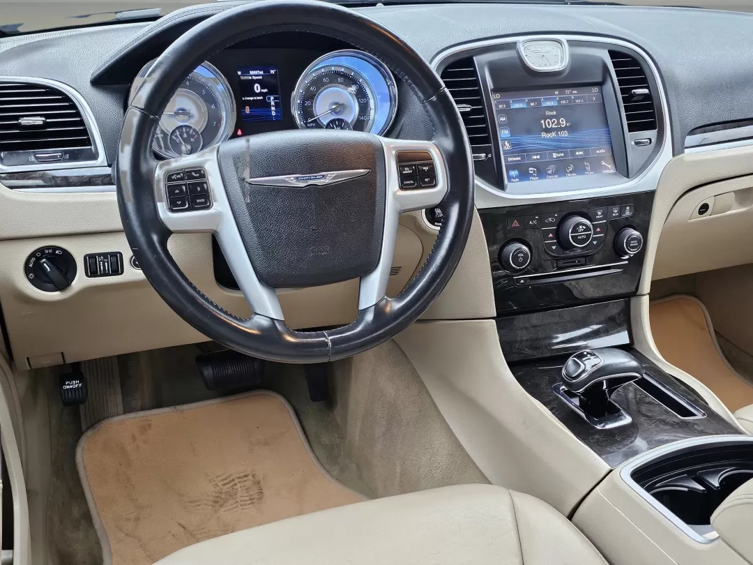 2014 /Lt Frost Beige/Black Chrysler 300 (2C3CCAAG0EH) with an Other engine, located at 3959 U.S. 80 W, Phenix City, AL, 36870, (334) 297-4885, 32.469296, -85.135185 - Discover the perfect blend of comfort, style, and performance with this stunning 2014 Chrysler 300, available now at Gils Auto in Phenix City, AL! Whether you're commuting to work, heading out for a weekend adventure, or simply running errands, this elegant sedan is designed to elevate your driving - Photo#16