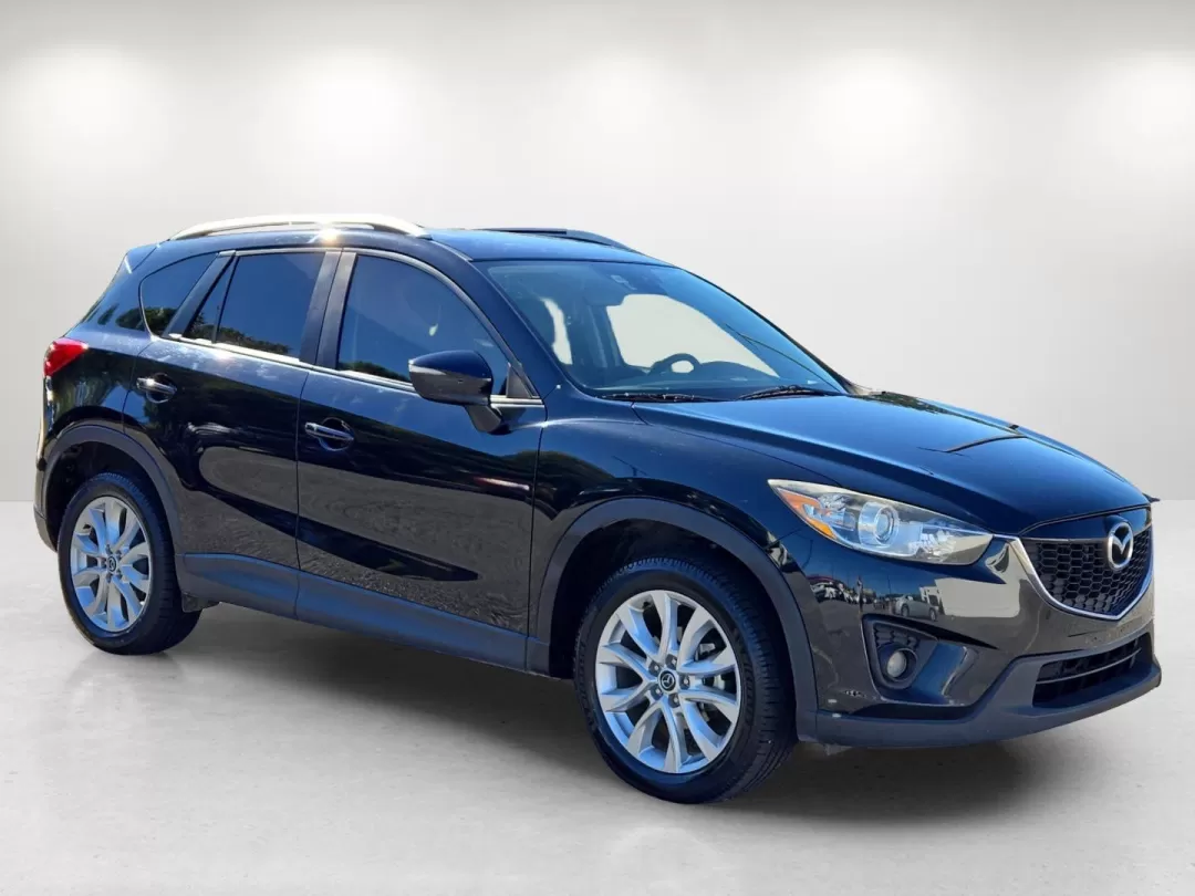 2015 /Black Mazda CX-5 Grand Touring (JM3KE2DYXF0) with an Other engine, located at 804 22nd Ave, Phenix City, AL, 36870, (334) 297-1860, 32.484749, -85.024475 - **Discover the Perfect SUV for Your Next Adventure: 2015 Mazda CX-5 Grand Touring at Gils Auto - Phenix City**<br /> <br /> Are you searching for a versatile vehicle that seamlessly fits your active lifestyle? Look no further than the 2015 Mazda CX-5 Grand Touring, available now at Gils Auto in Phen - Photo#3
