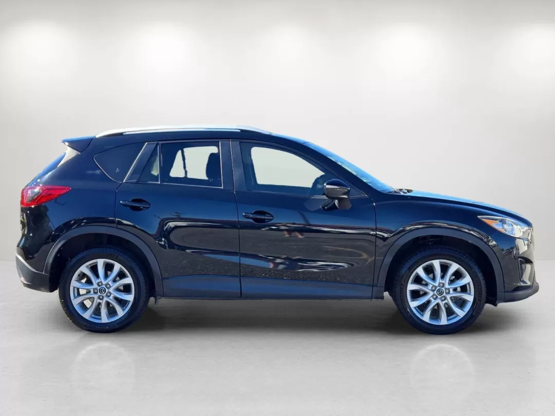 2015 /Black Mazda CX-5 Grand Touring (JM3KE2DYXF0) with an Other engine, located at 804 22nd Ave, Phenix City, AL, 36870, (334) 297-1860, 32.484749, -85.024475 - **Discover the Perfect SUV for Your Next Adventure: 2015 Mazda CX-5 Grand Touring at Gils Auto - Phenix City**<br /> <br /> Are you searching for a versatile vehicle that seamlessly fits your active lifestyle? Look no further than the 2015 Mazda CX-5 Grand Touring, available now at Gils Auto in Phen - Photo#4