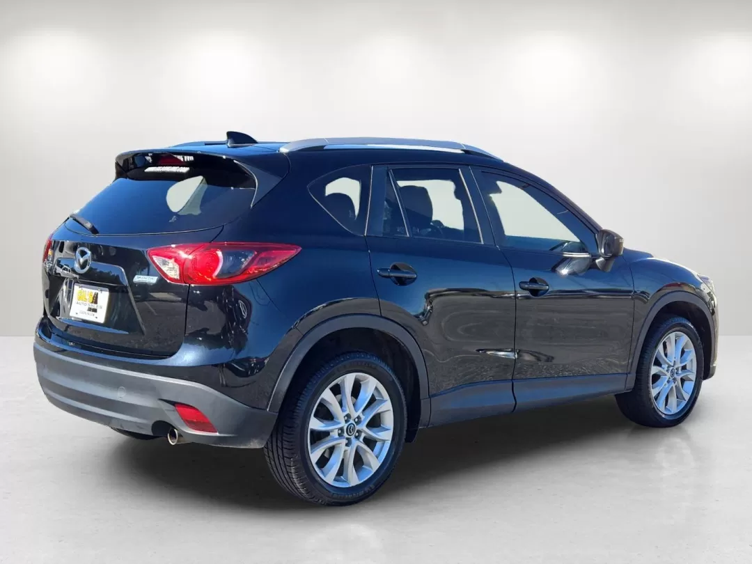 2015 /Black Mazda CX-5 Grand Touring (JM3KE2DYXF0) with an Other engine, located at 804 22nd Ave, Phenix City, AL, 36870, (334) 297-1860, 32.484749, -85.024475 - **Discover the Perfect SUV for Your Next Adventure: 2015 Mazda CX-5 Grand Touring at Gils Auto - Phenix City**<br /> <br /> Are you searching for a versatile vehicle that seamlessly fits your active lifestyle? Look no further than the 2015 Mazda CX-5 Grand Touring, available now at Gils Auto in Phen - Photo#5