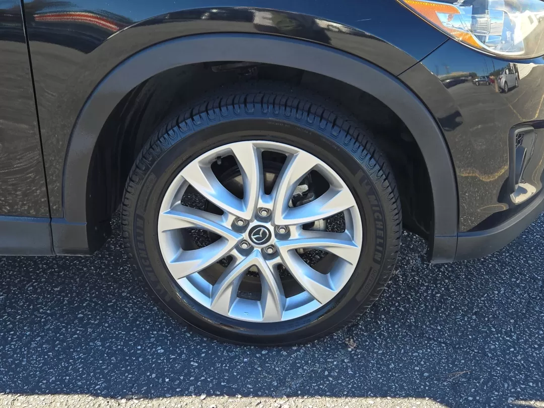 2015 /Black Mazda CX-5 Grand Touring (JM3KE2DYXF0) with an Other engine, located at 3959 U.S. 80 W, Phenix City, AL, 36870, (334) 297-4885, 32.469296, -85.135185 - **Discover the Perfect SUV for Your Next Adventure: 2015 Mazda CX-5 Grand Touring at Gils Auto - Phenix City**<br /> <br /> Are you searching for a versatile vehicle that seamlessly fits your active lifestyle? Look no further than the 2015 Mazda CX-5 Grand Touring, available now at Gils Auto in Phen - Photo#2