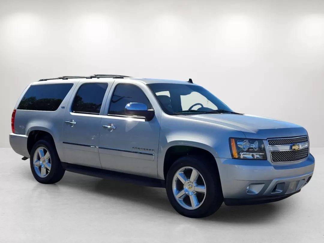 2013 /Light Titanium/Dark Titanium Chevrolet Suburban LTZ (1GNSCKE02DR) with an Other engine, located at 3959 U.S. 80 W, Phenix City, AL, 36870, (334) 297-4885, 32.469296, -85.135185 - Step into a world of adventure and family bonding with this 2013 Chevrolet Suburban LTZ, available now at Gils Auto in Phenix City, AL. Ideal for growing families or anyone who loves the open road, this spacious SUV combines luxury, comfort, and versatility for those seeking a reliable vehicle for e - Photo#4