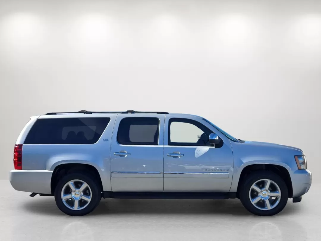 2013 /Light Titanium/Dark Titanium Chevrolet Suburban LTZ (1GNSCKE02DR) with an Other engine, located at 3959 U.S. 80 W, Phenix City, AL, 36870, (334) 297-4885, 32.469296, -85.135185 - Step into a world of adventure and family bonding with this 2013 Chevrolet Suburban LTZ, available now at Gils Auto in Phenix City, AL. Ideal for growing families or anyone who loves the open road, this spacious SUV combines luxury, comfort, and versatility for those seeking a reliable vehicle for e - Photo#5